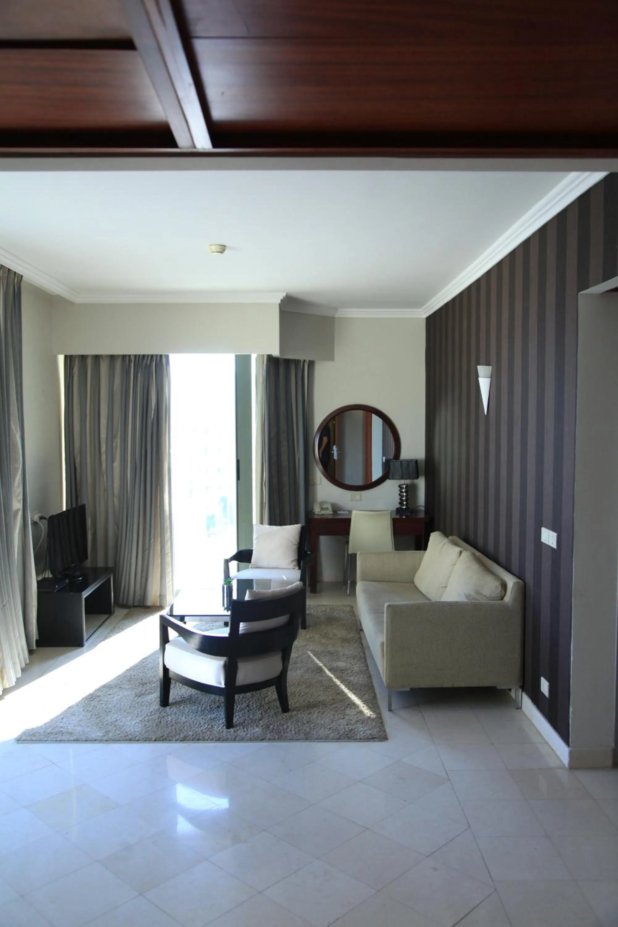 Seating area, Bed in Royal Dead Sea - Hotel & Spa