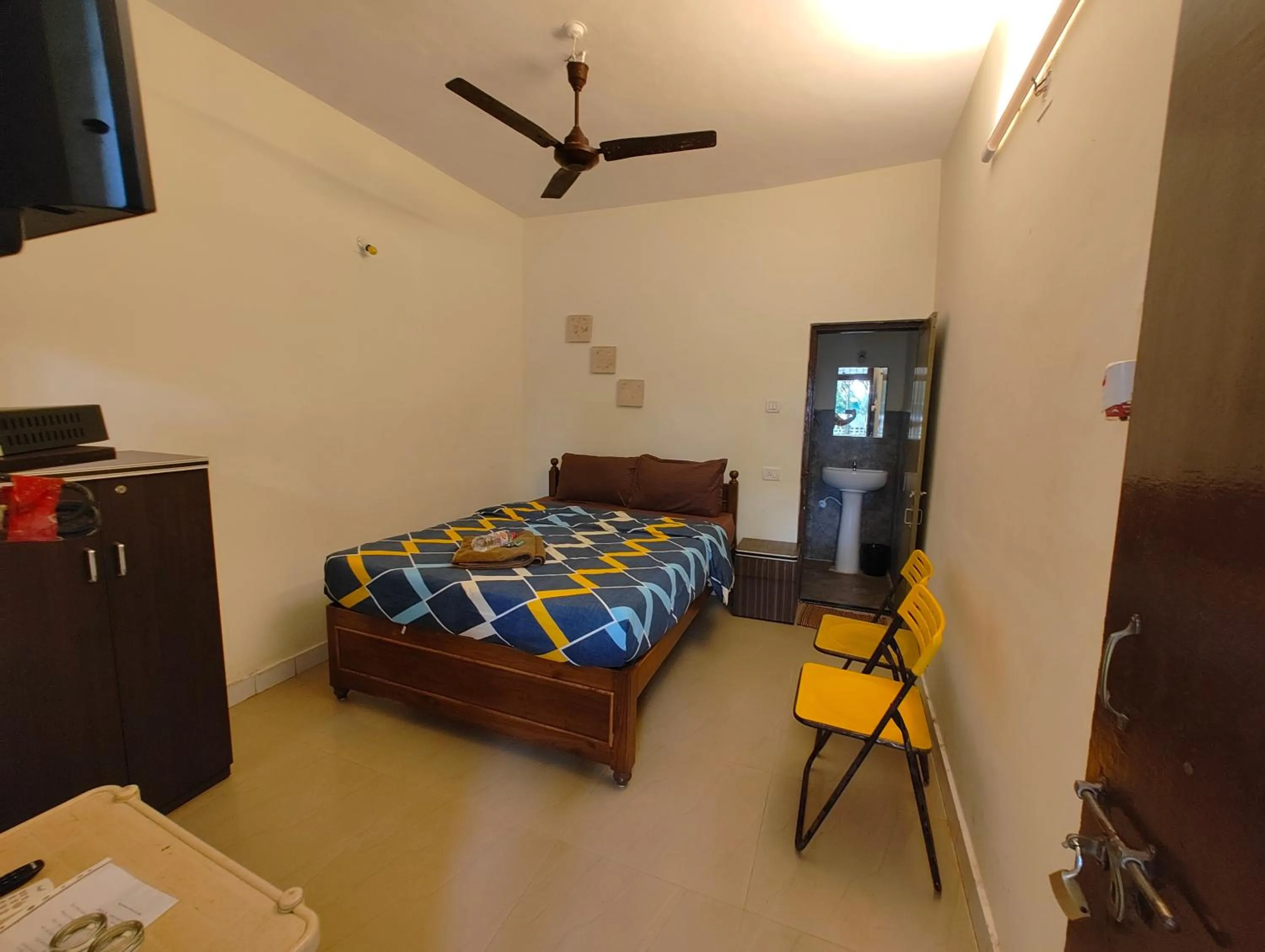 Bed in Vinsons Cottages