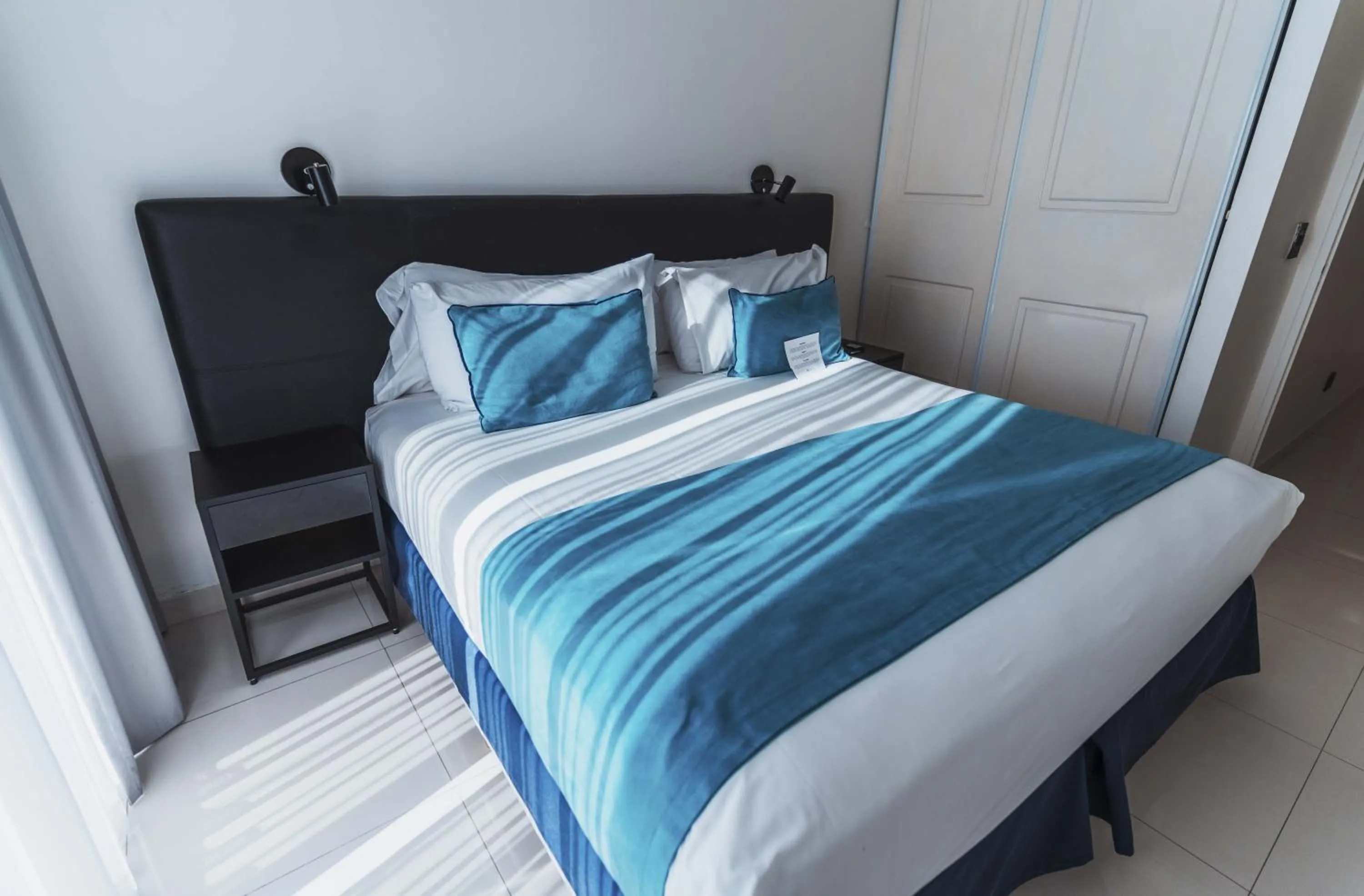 Bed in Cyan Recoleta Hotel