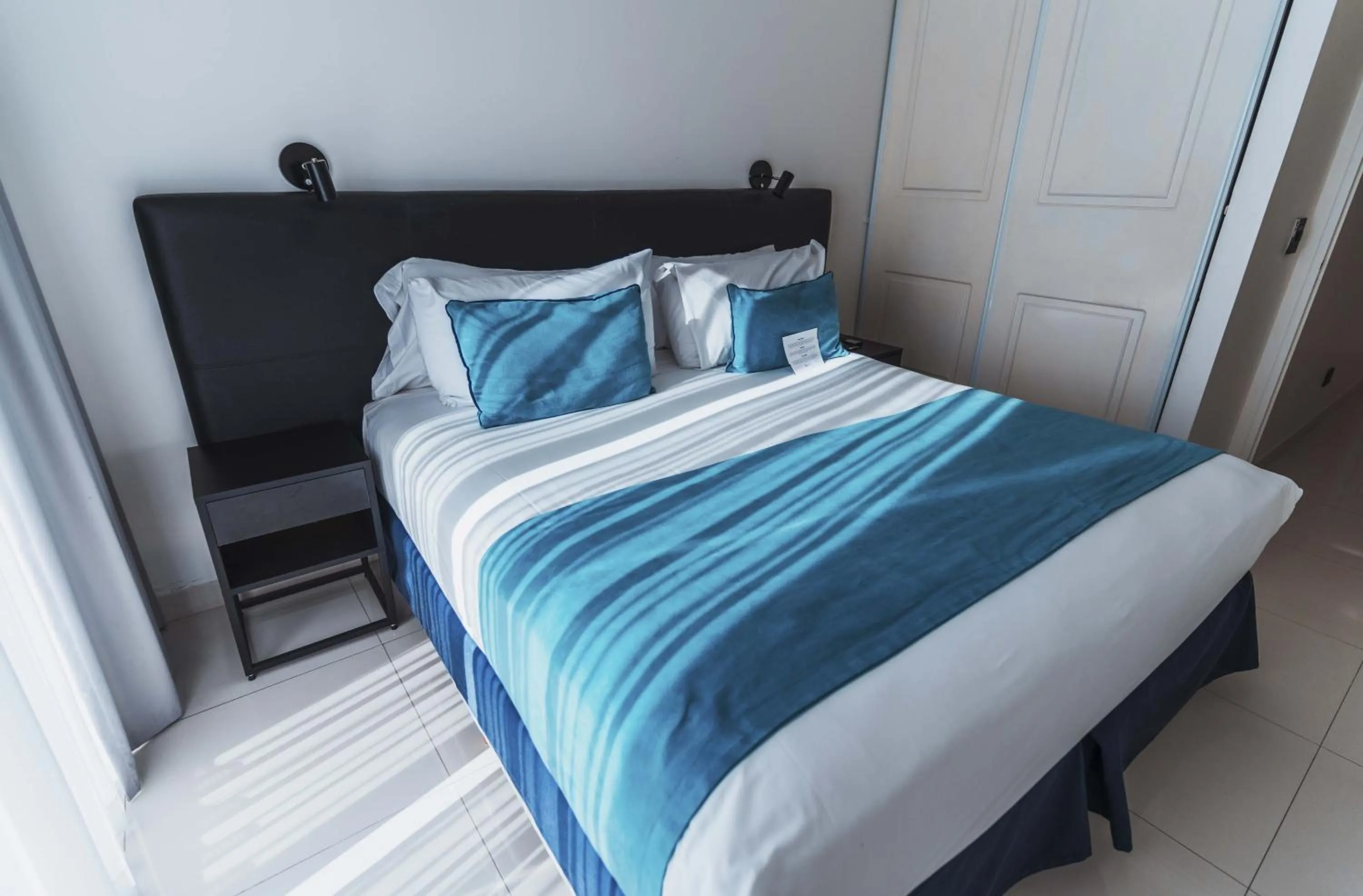 Bed in Cyan Recoleta Hotel