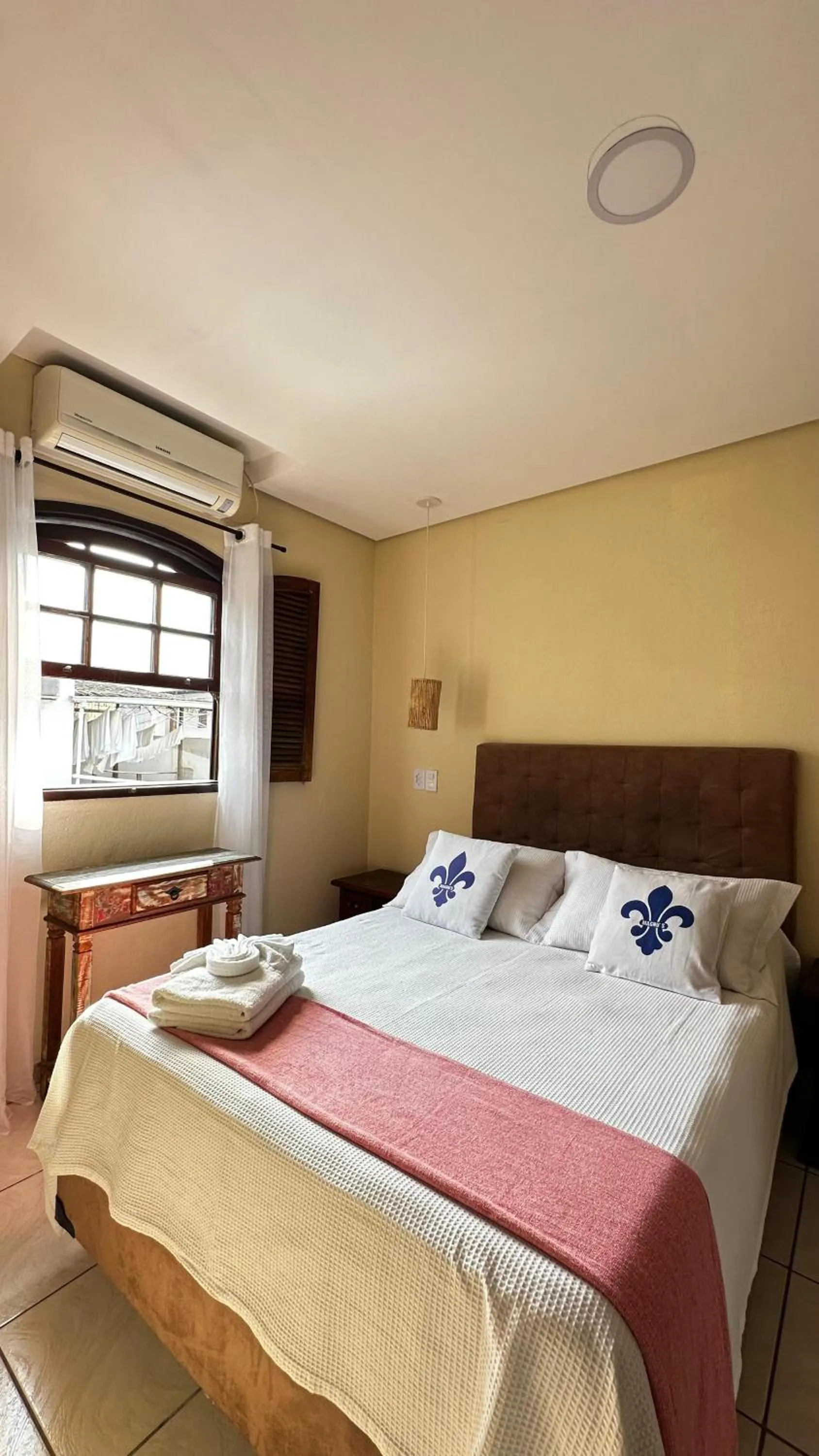 Bed in Magnu´s Pousada