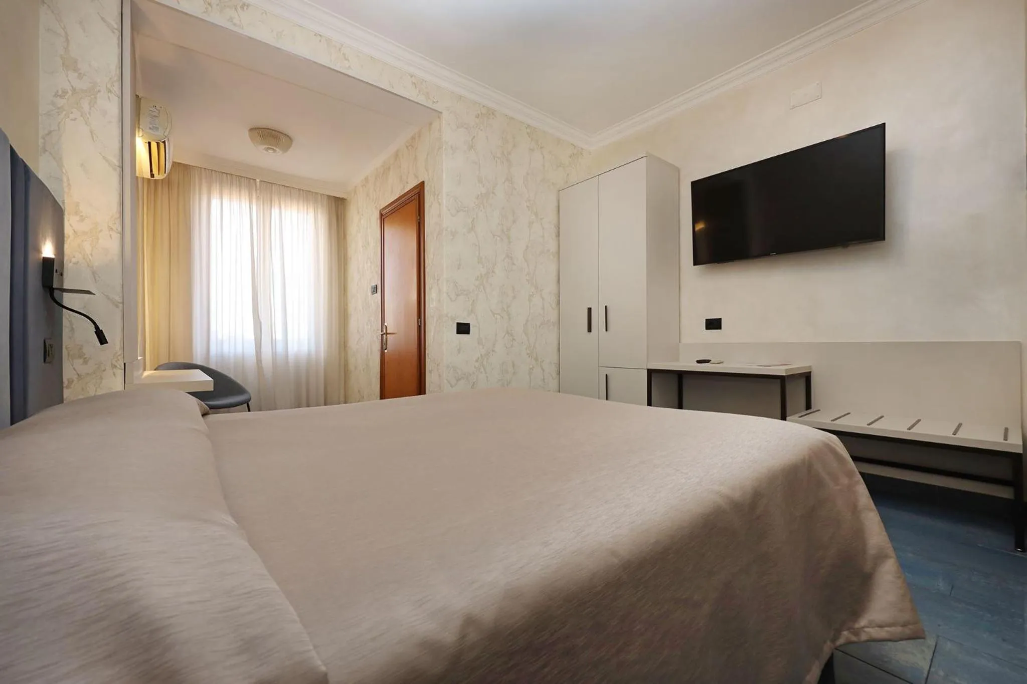 Bed in Hotel Rimini