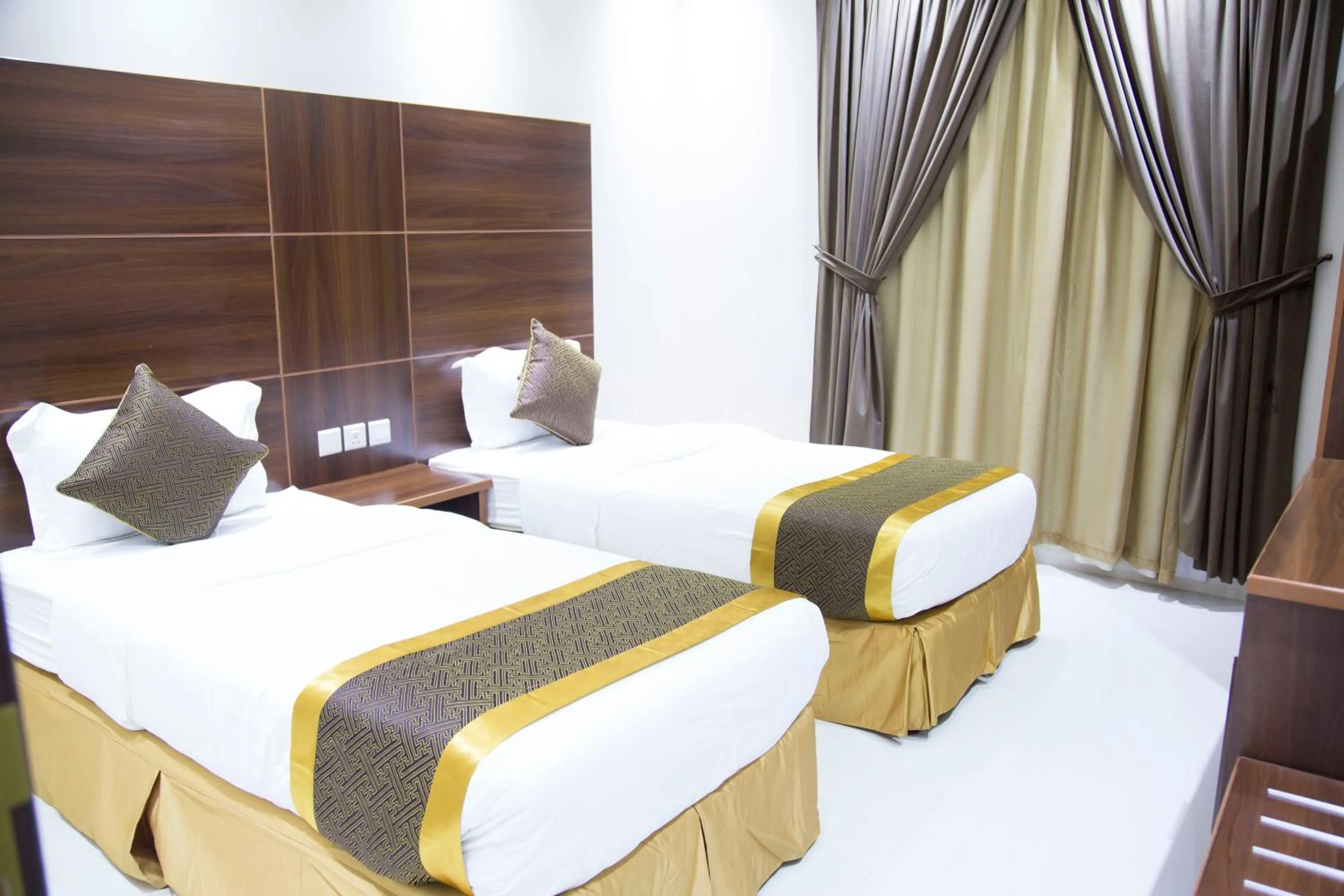 Bed in Alharir Hotel Apartments