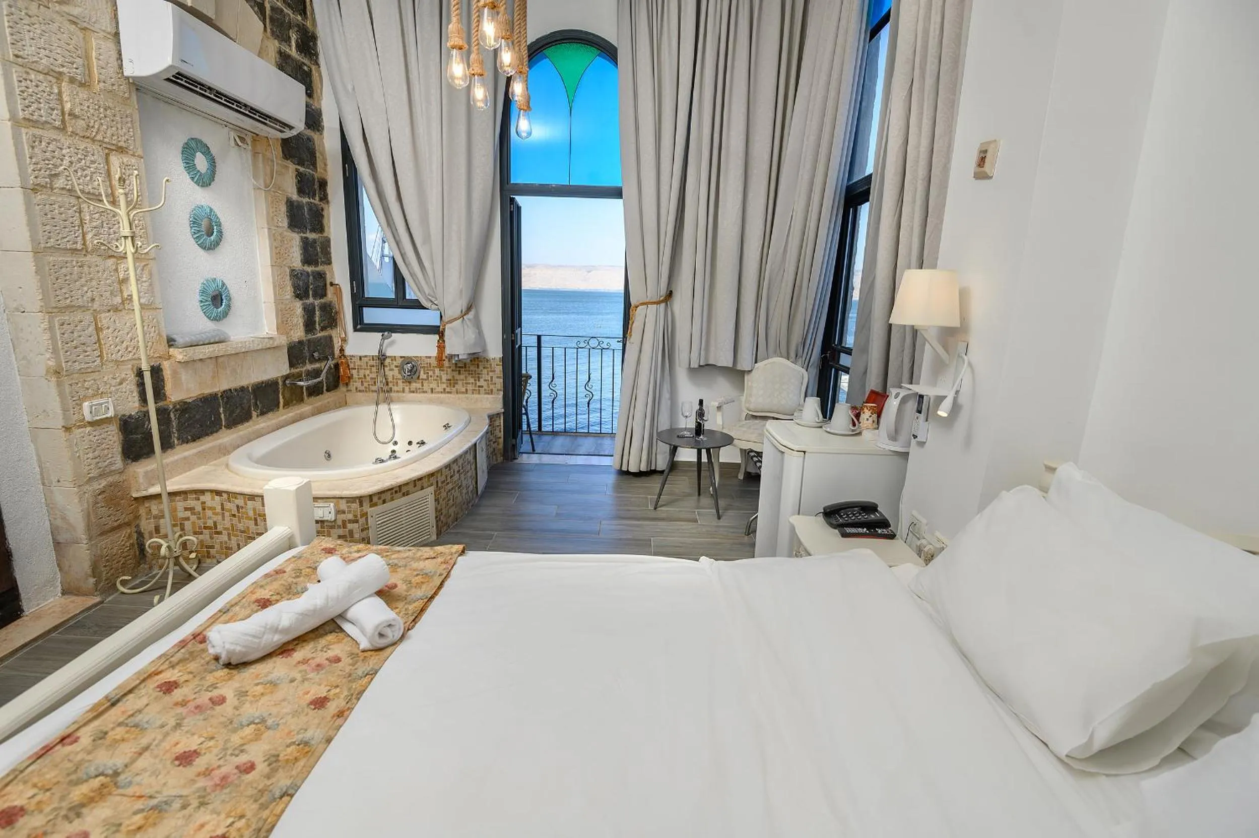 Bed in Shirat Hayam Boutique Hotel