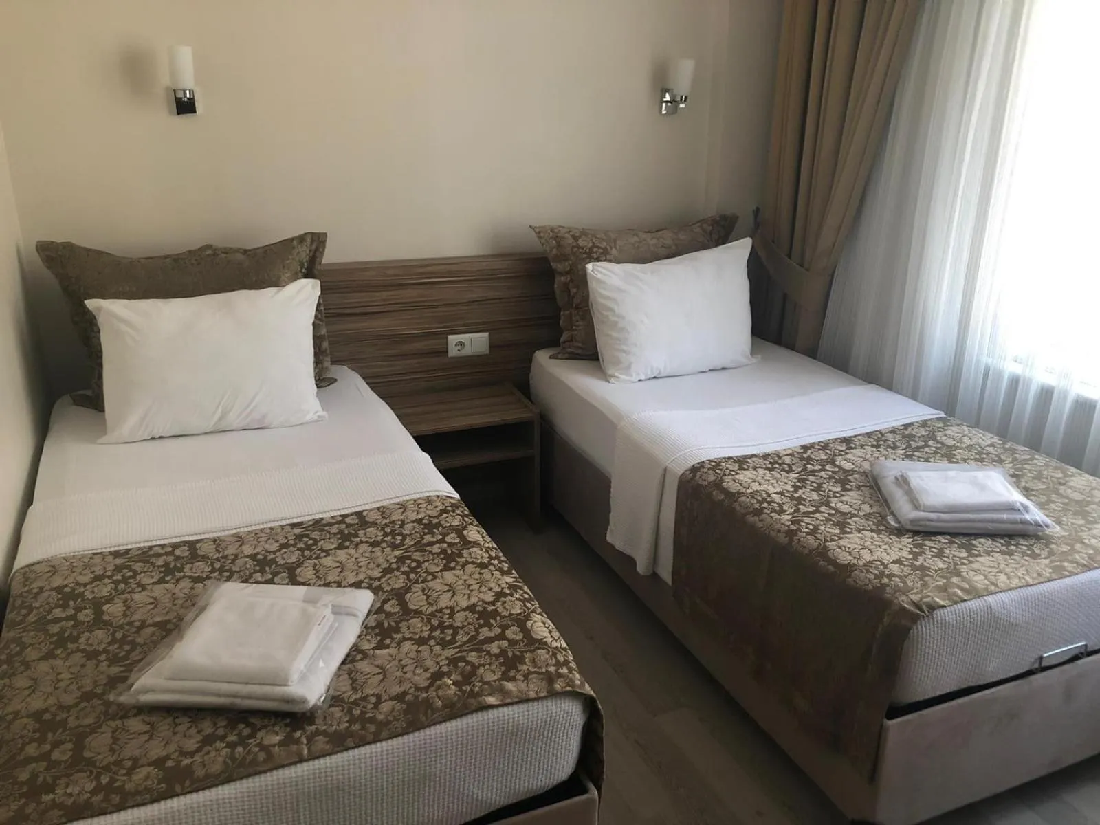 Bed in Sinopark Hotel