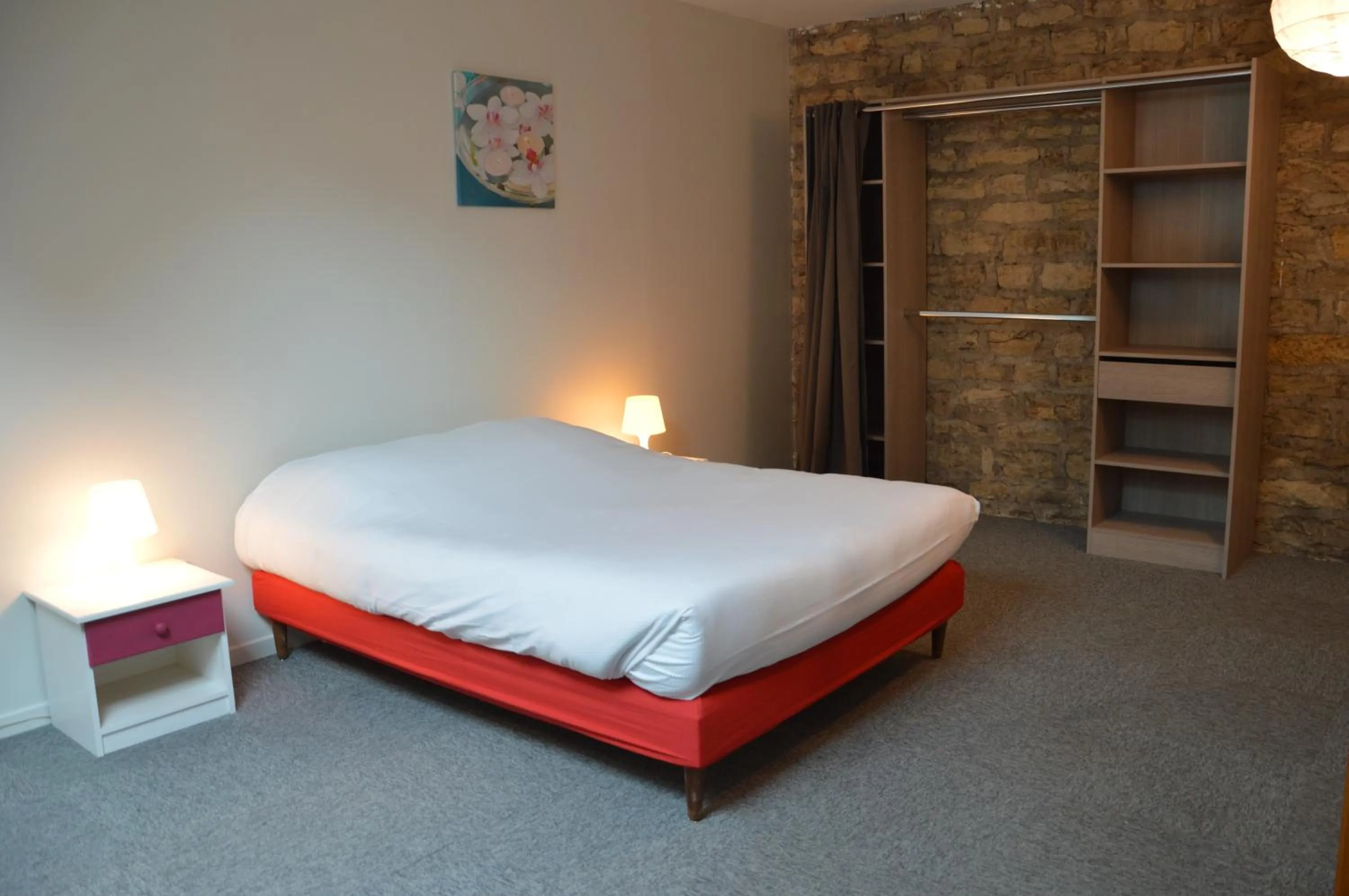 Bed in Hôtel de la Colombière