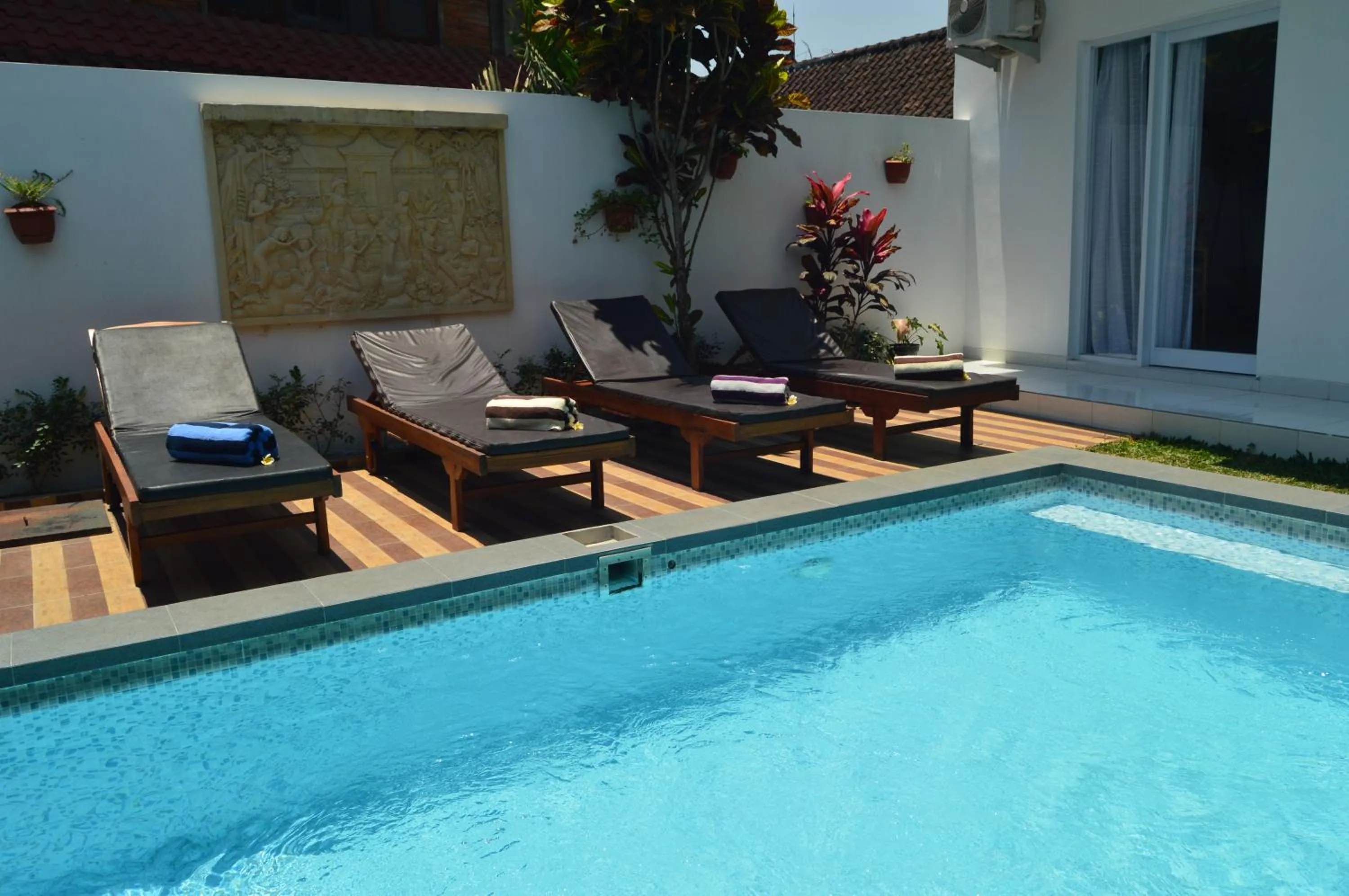 Swimming pool in Askara Guest House & Hostel