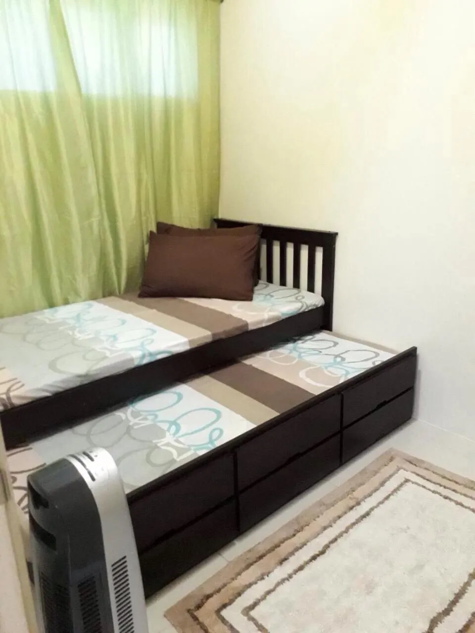 Bed in Wind Residences by Bea and RM