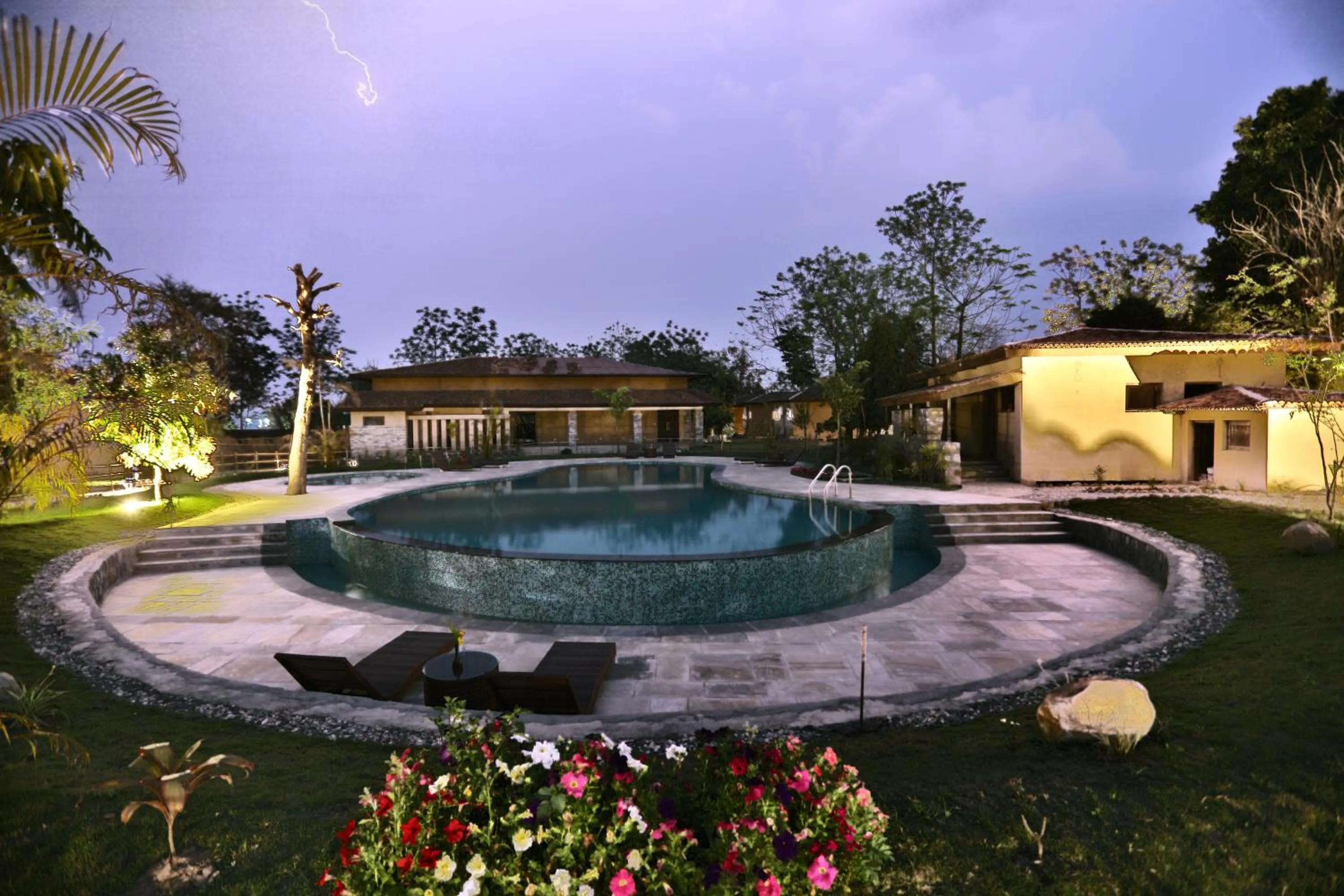 Swimming pool in Jungle Villa Resort - Near Chitwan National Park