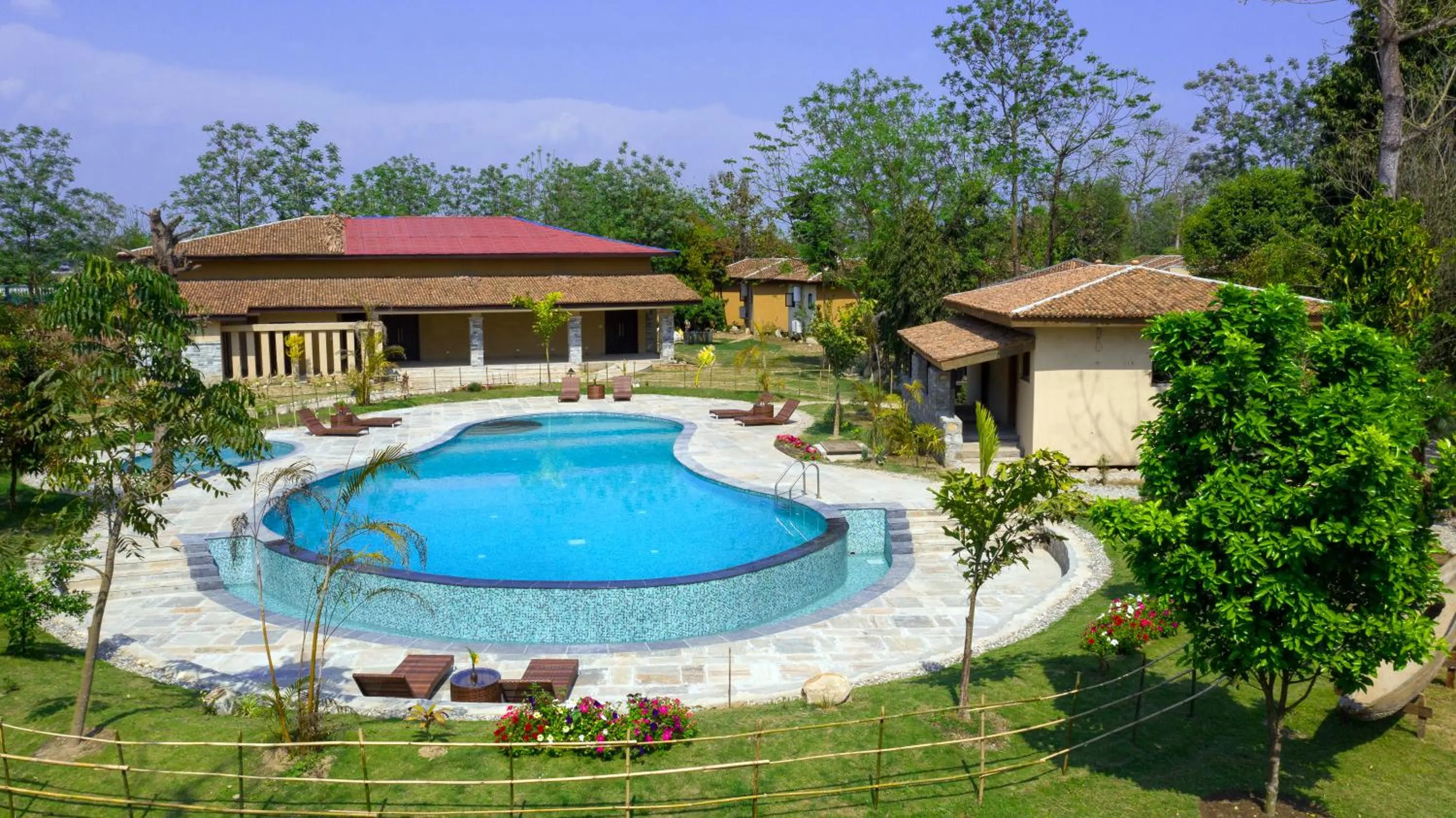 Swimming pool in Jungle Villa Resort - Near Chitwan National Park
