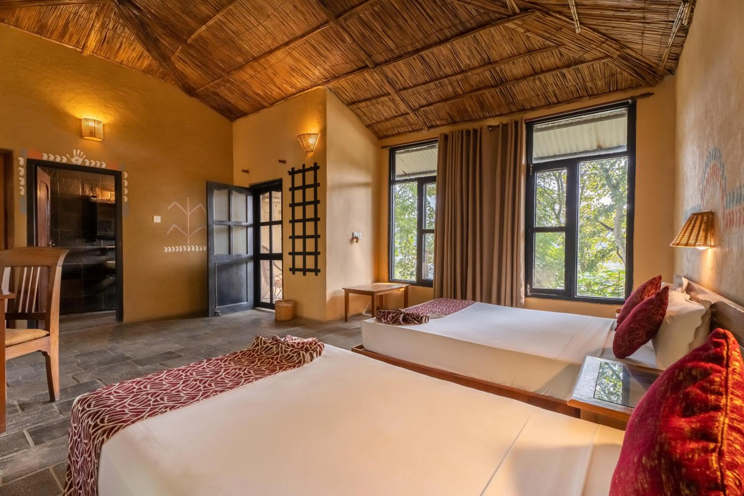 Bedroom, Bed in Jungle Villa Resort - Near Chitwan National Park