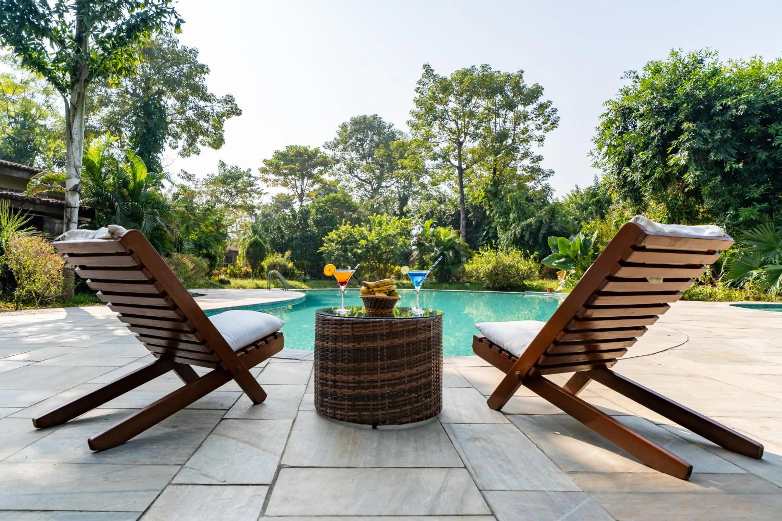Swimming pool in Jungle Villa Resort - Near Chitwan National Park