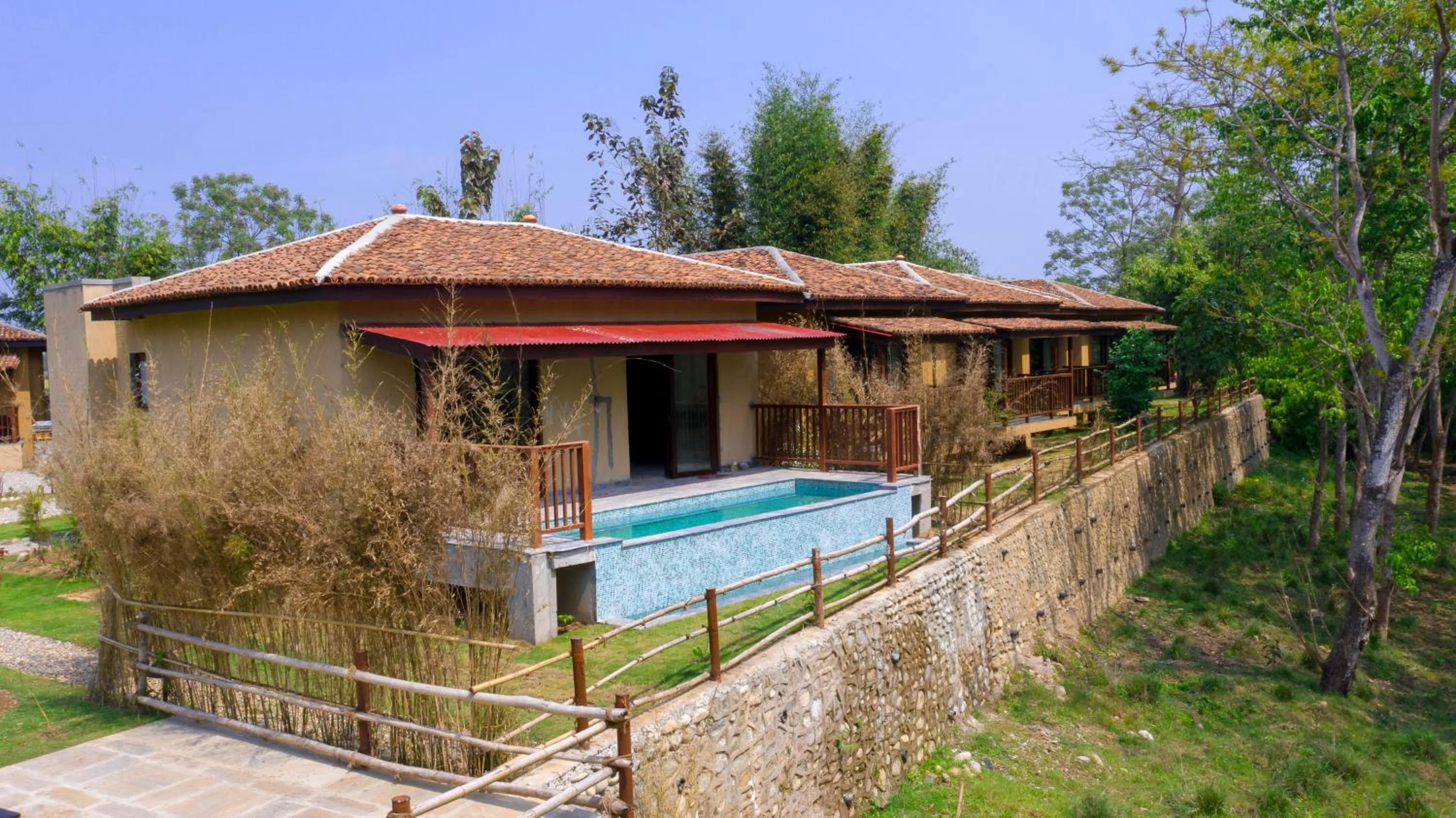 Swimming pool in Jungle Villa Resort - Near Chitwan National Park