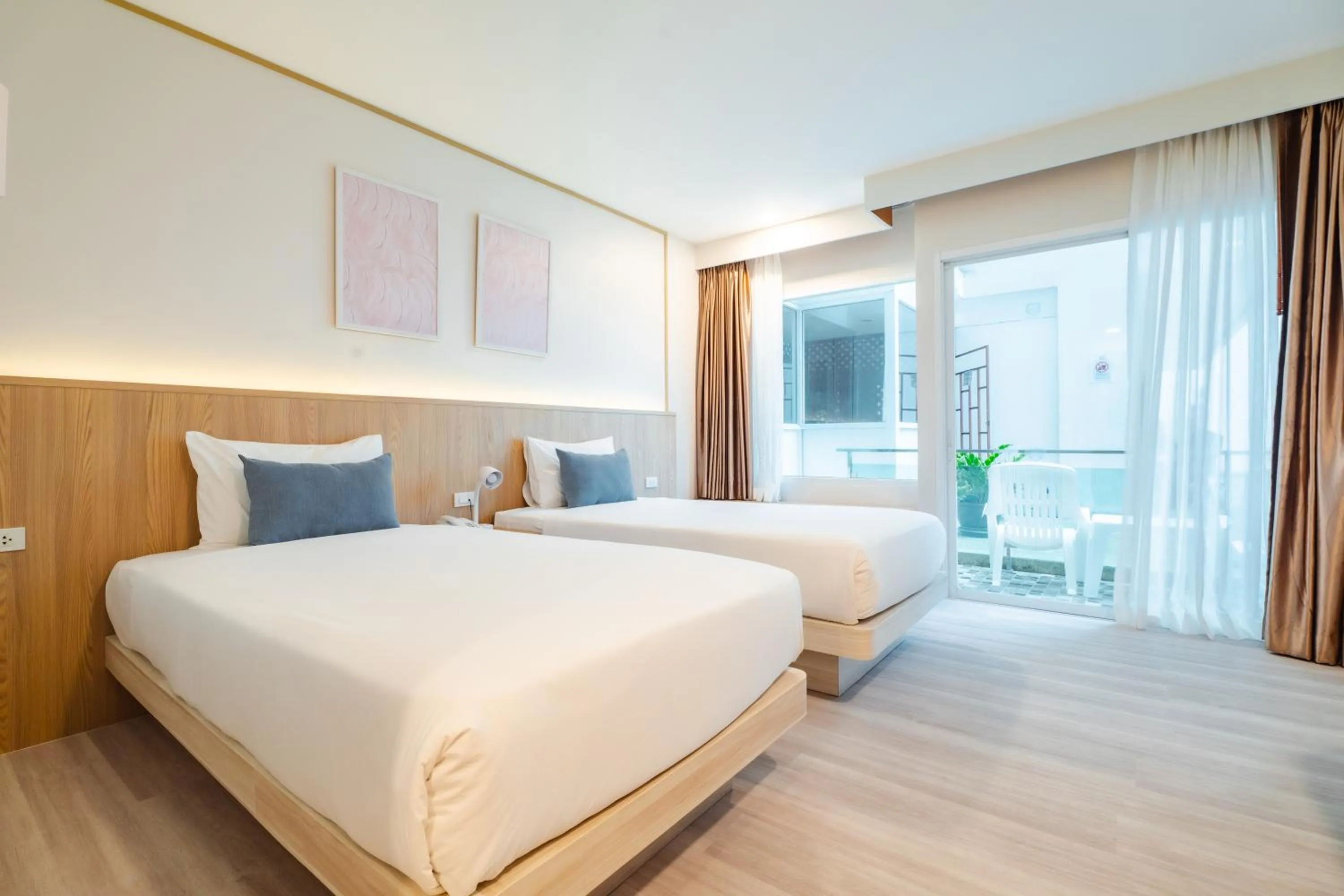 Photo of the whole room, Bed in Baumancasa Beach Resort