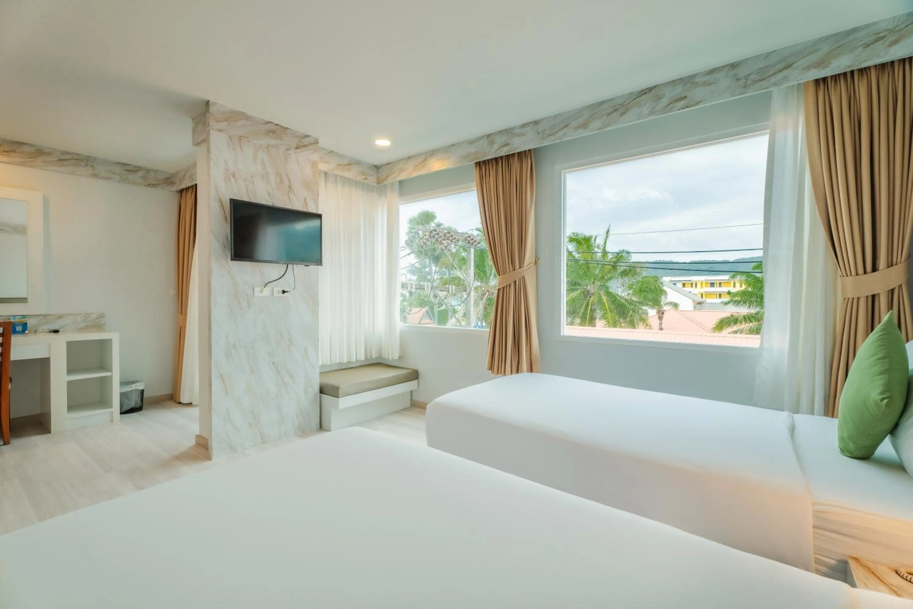 Photo of the whole room, Bed in Baumancasa Beach Resort
