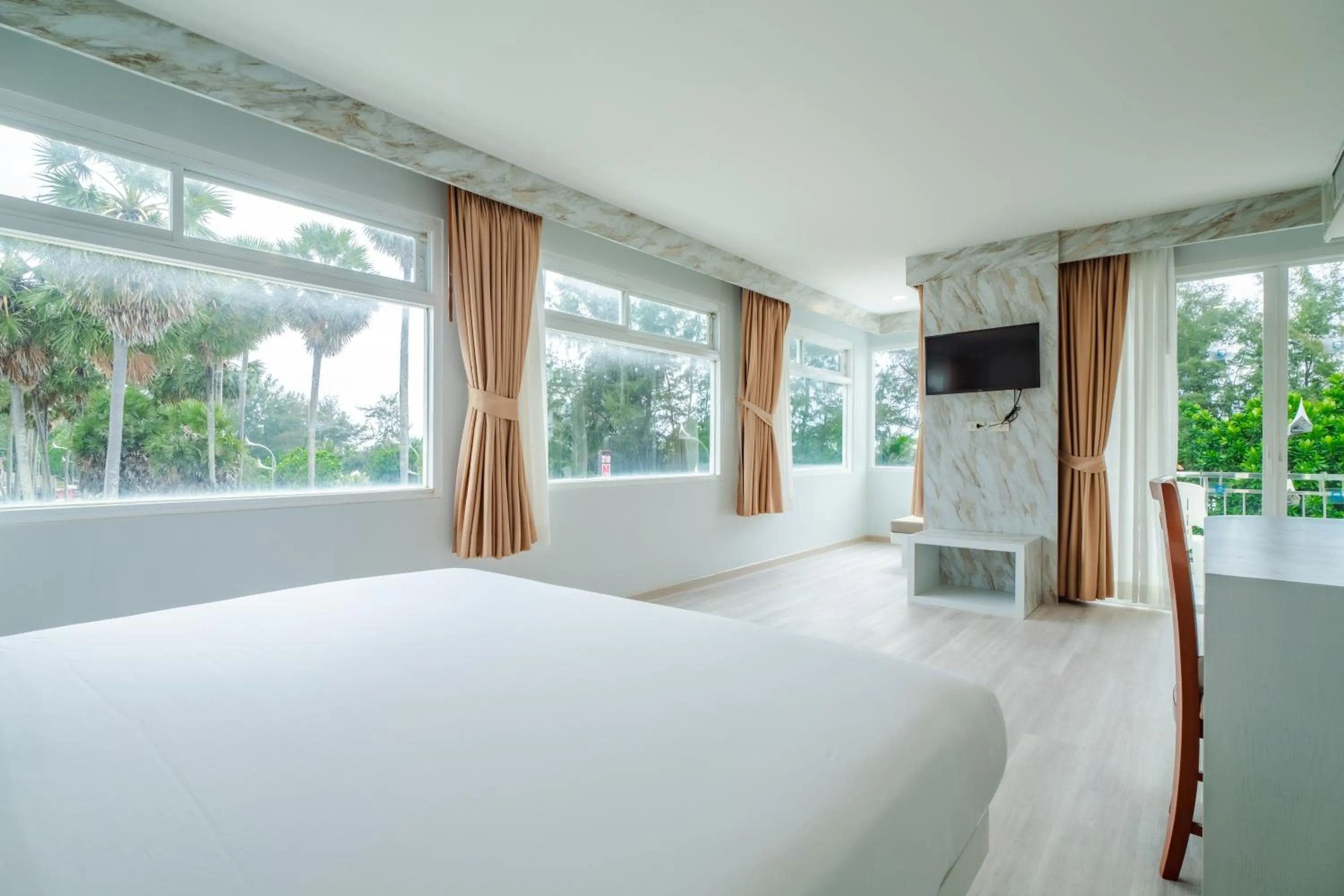 Photo of the whole room, Bed in Baumancasa Beach Resort