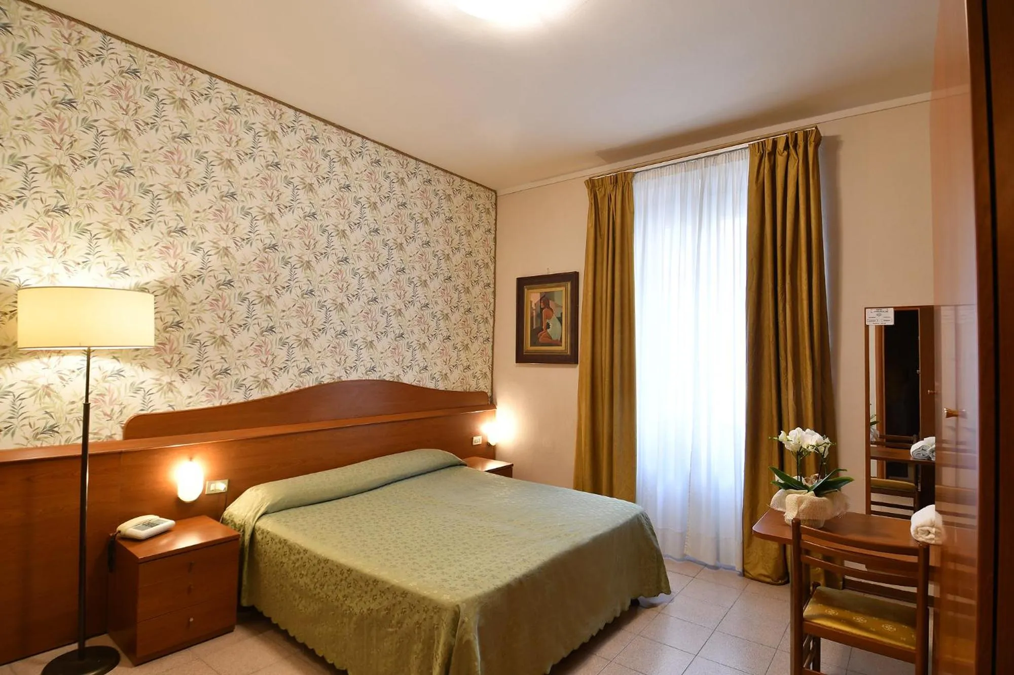 Bed in Hotel Innocenti