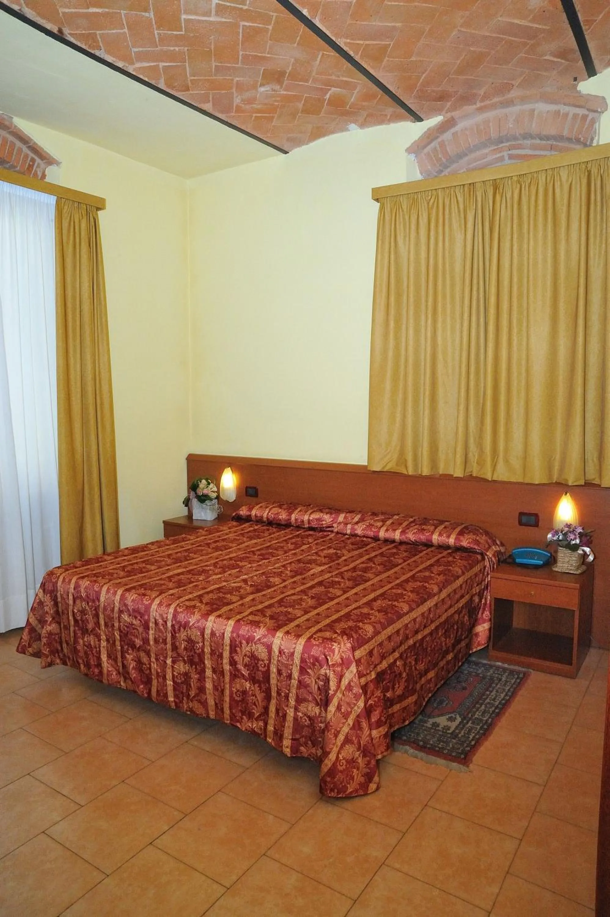 Bed in Hotel Innocenti