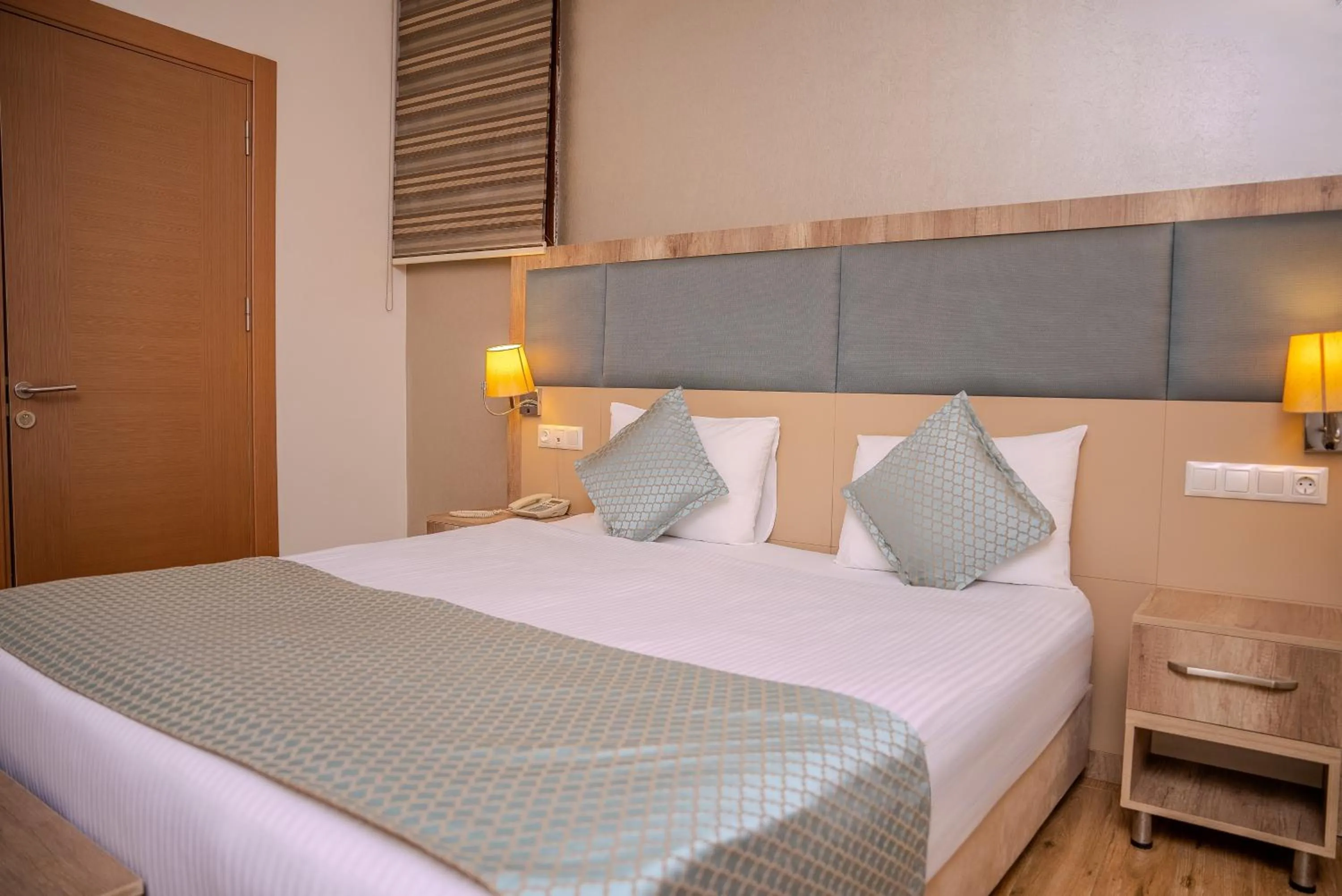 Bedroom, Bed in Mari Suites Hotel