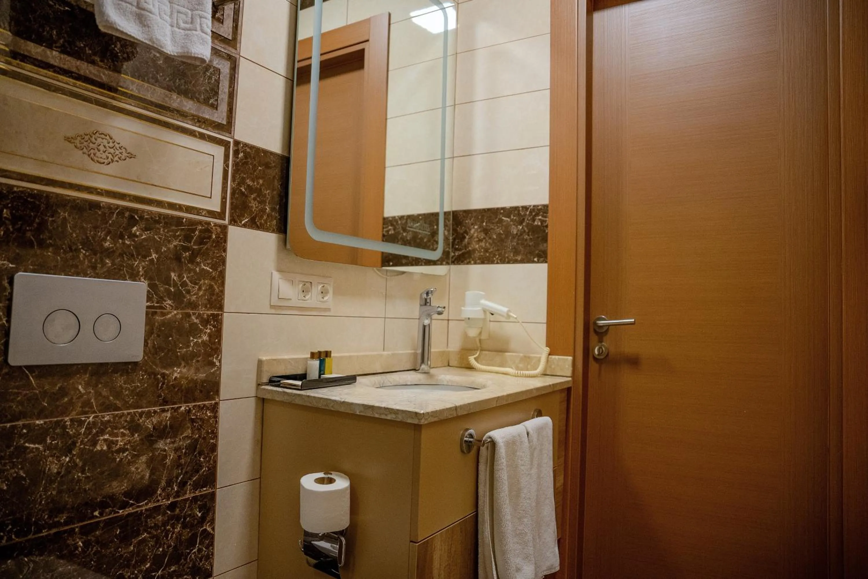 Bathroom in Mari Suites Hotel