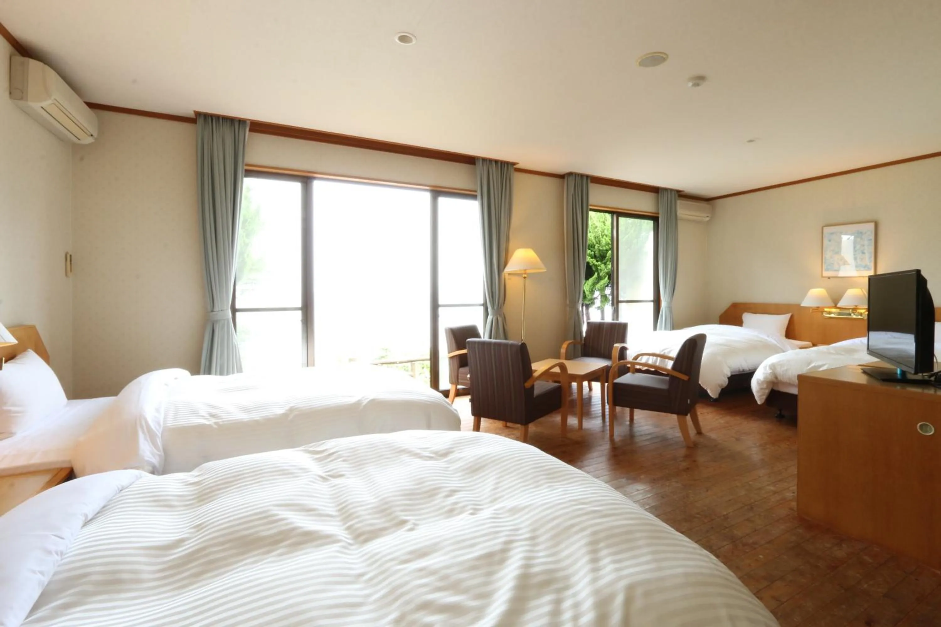 Bedroom, Bed in Tsushima Grand Hotel
