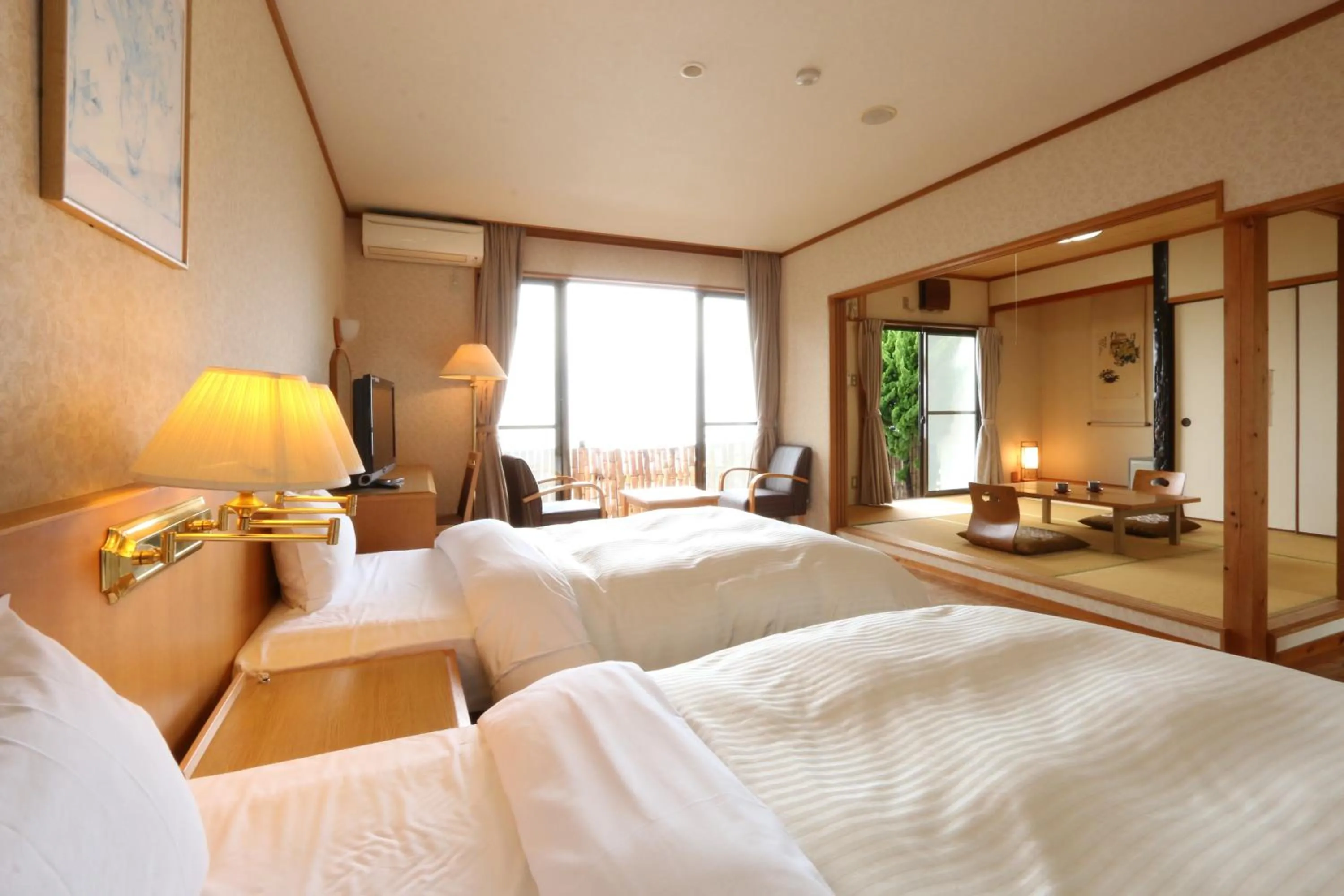 Photo of the whole room, Bed in Tsushima Grand Hotel