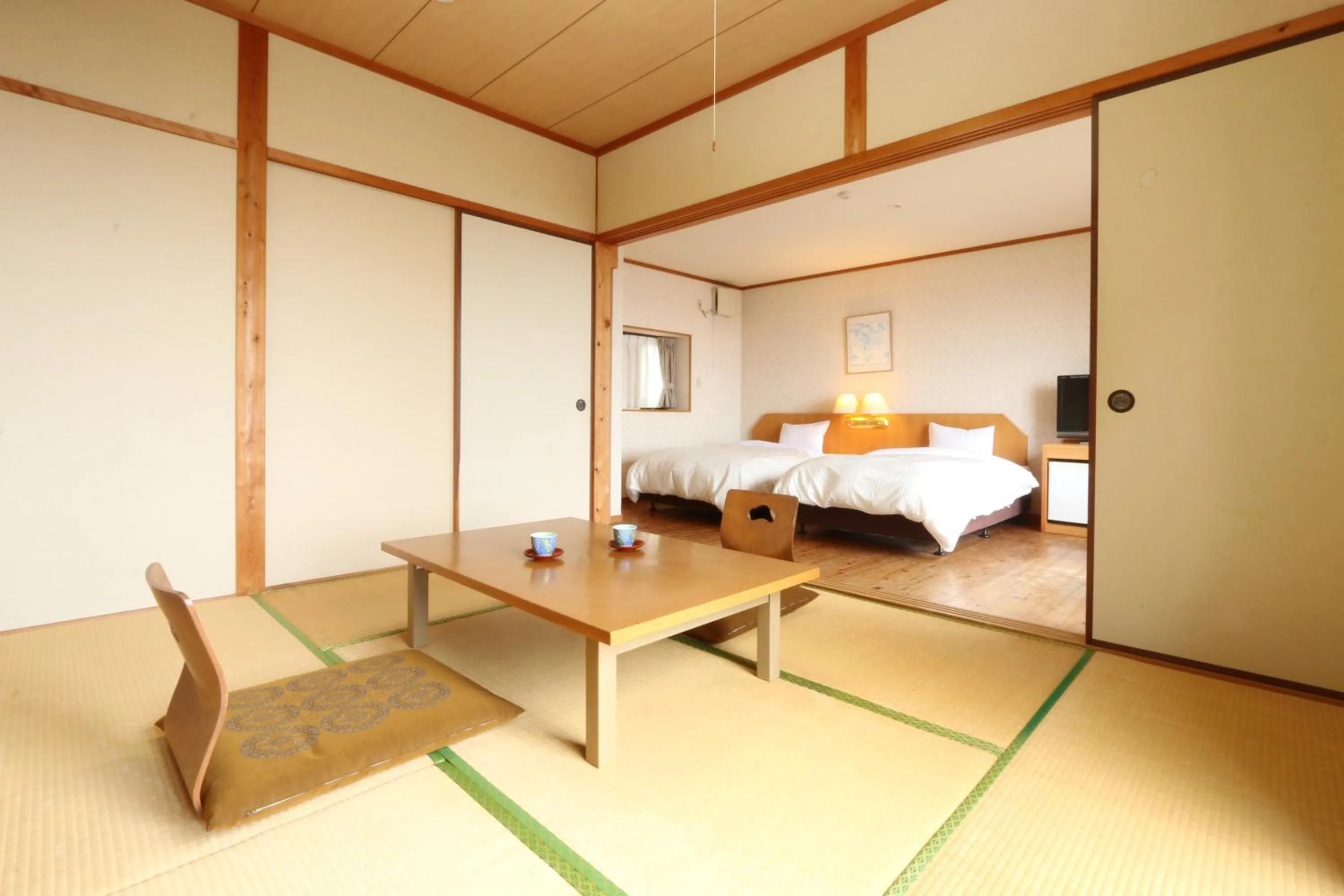 Photo of the whole room, Bed in Tsushima Grand Hotel