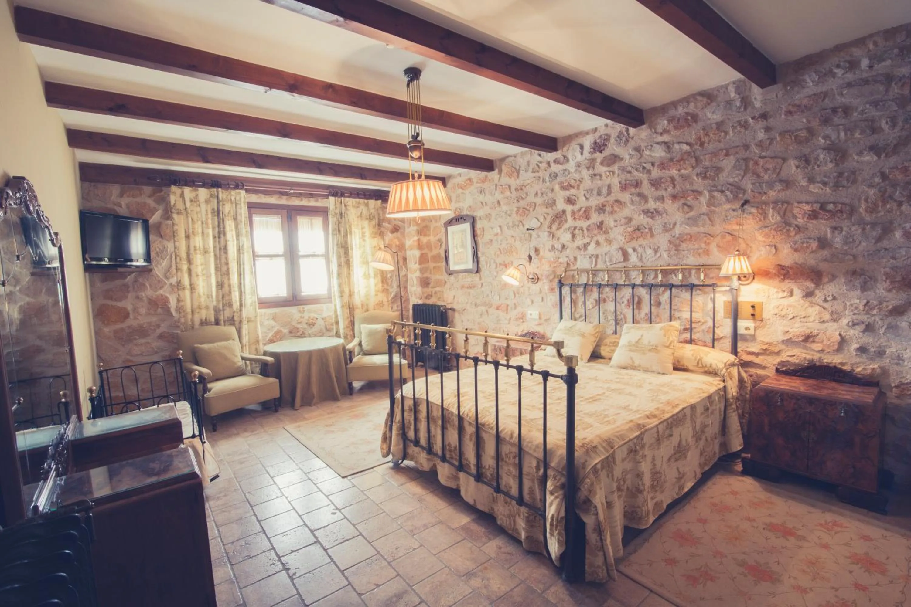 Bed in Hotel Mesón de Don Quijote