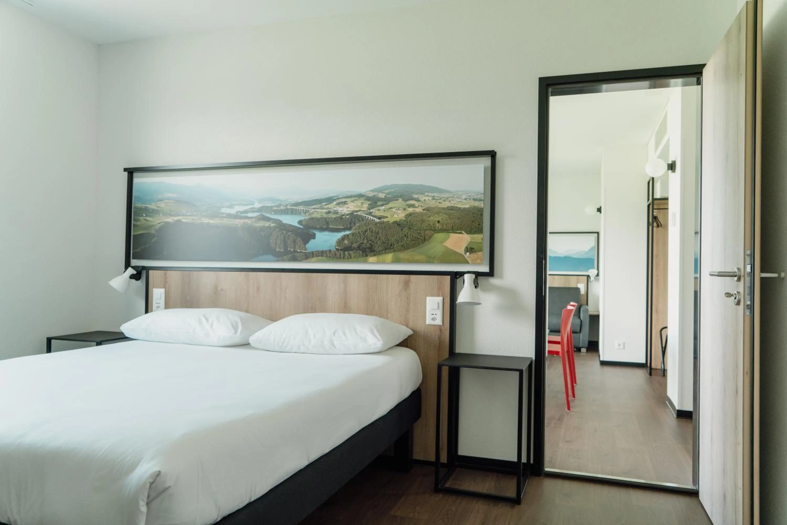 Bedroom, Bed in ibis Bulle - La Gruyère Swiss Bike Hotel