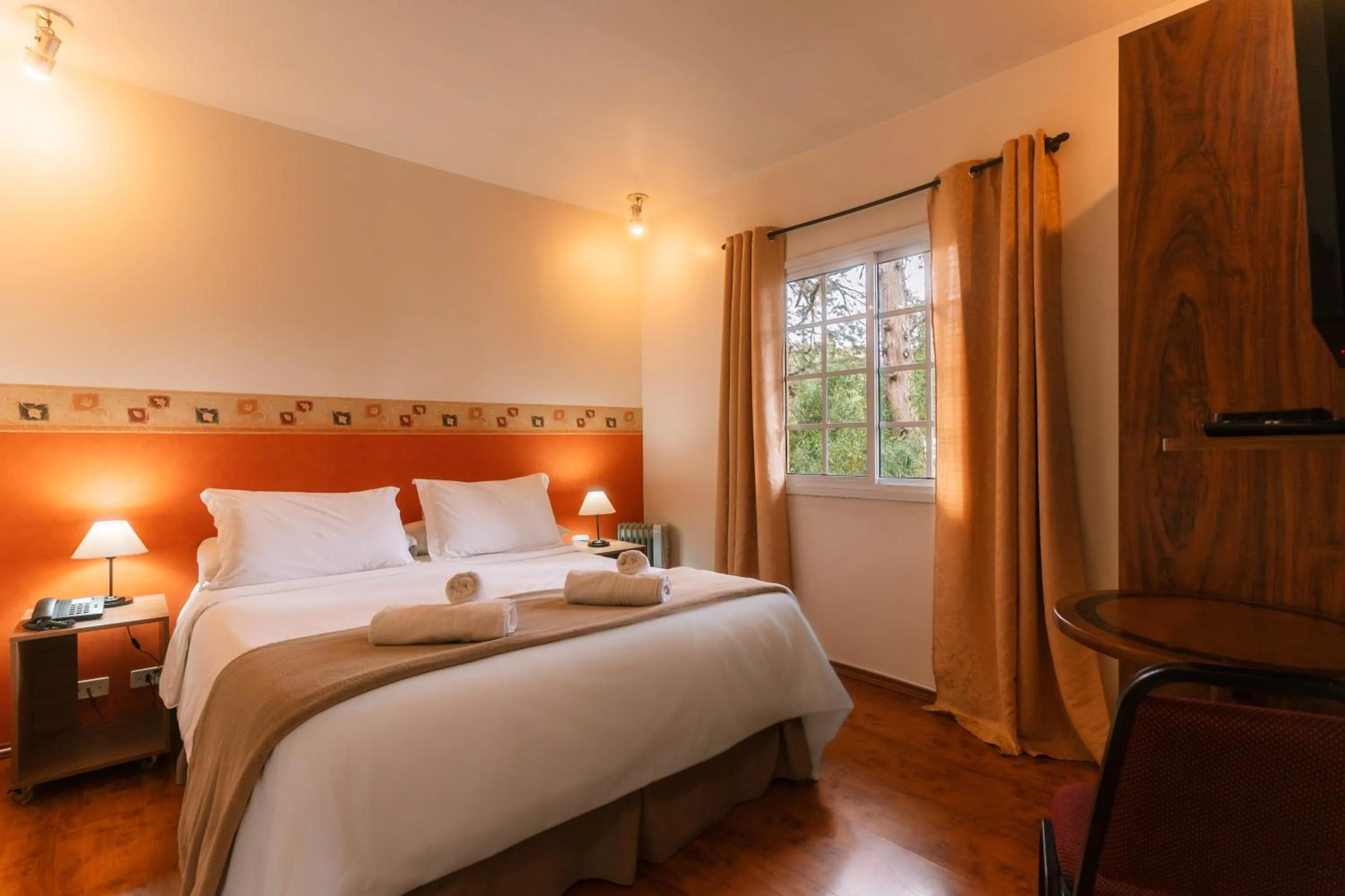 Bed in Pousada La Toscana Campos do Jordão