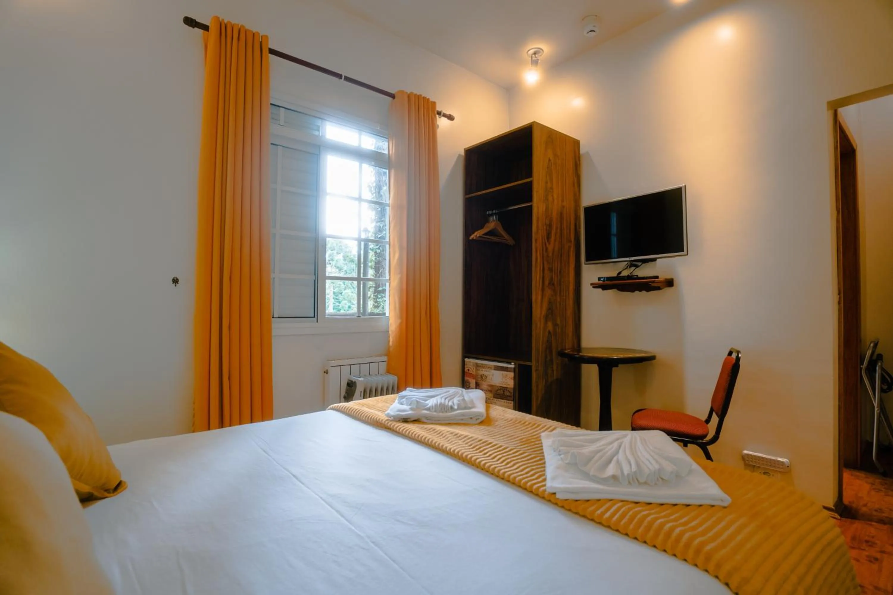 Bedroom, Bed in Pousada La Toscana Campos do Jordão