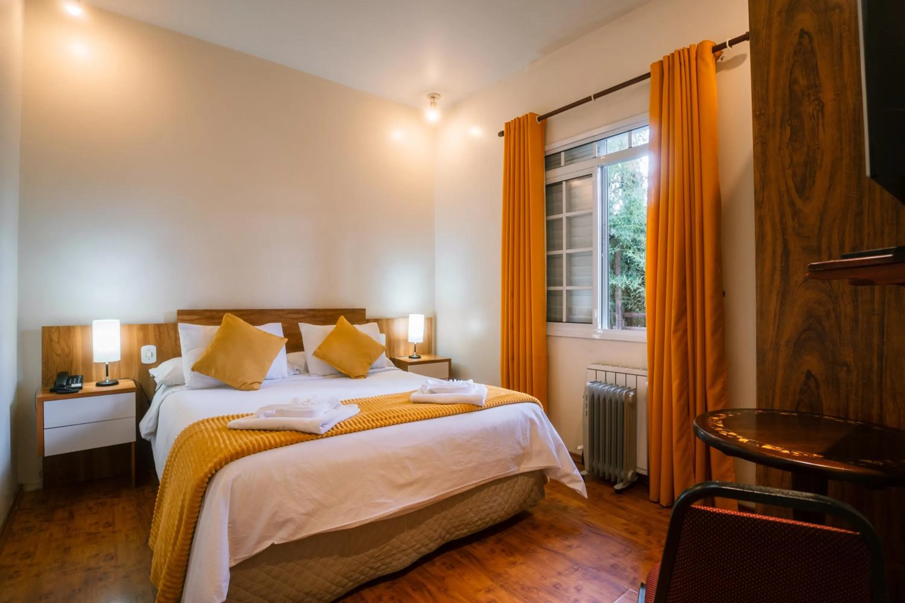 Bed in Pousada La Toscana Campos do Jordão