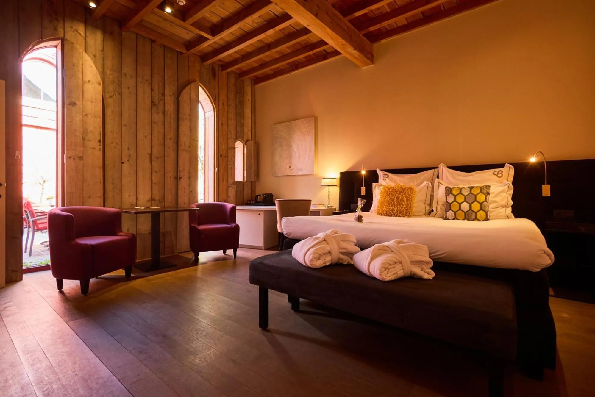 Living room, Bed in B&B Huize Briers