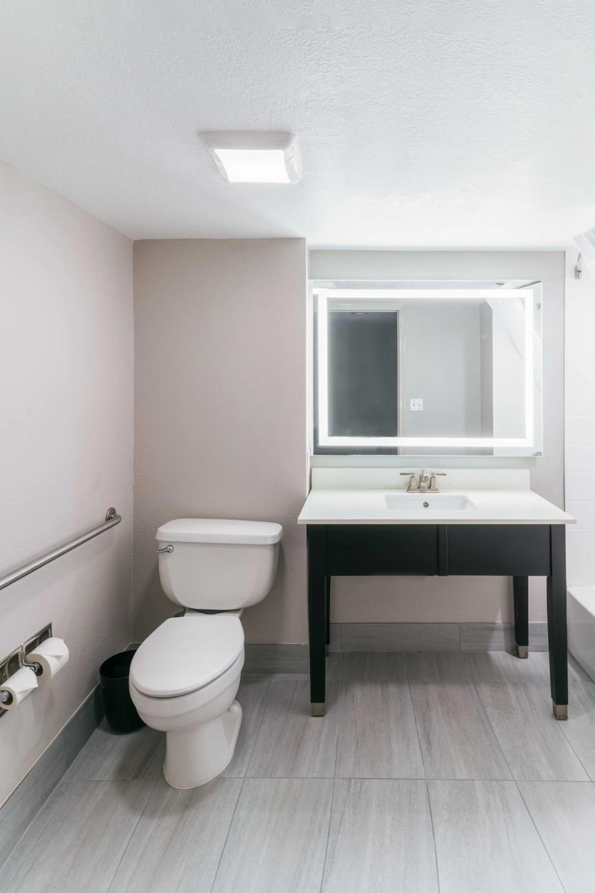 Toilet in Townhome Inn & Suites by IHG