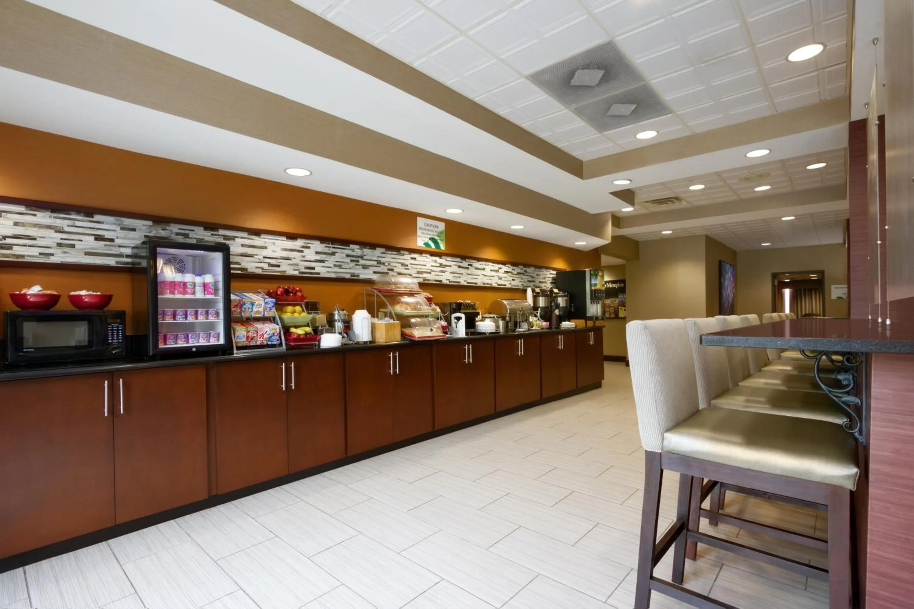 Continental breakfast in Townhome Inn & Suites by IHG