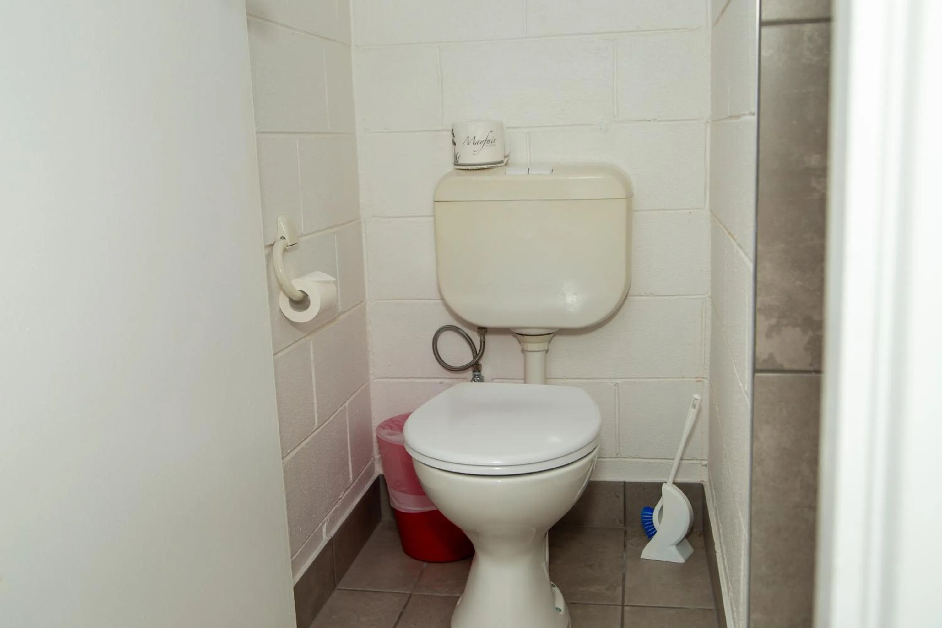 Toilet in Ocean Views Motel Lakes Entrance