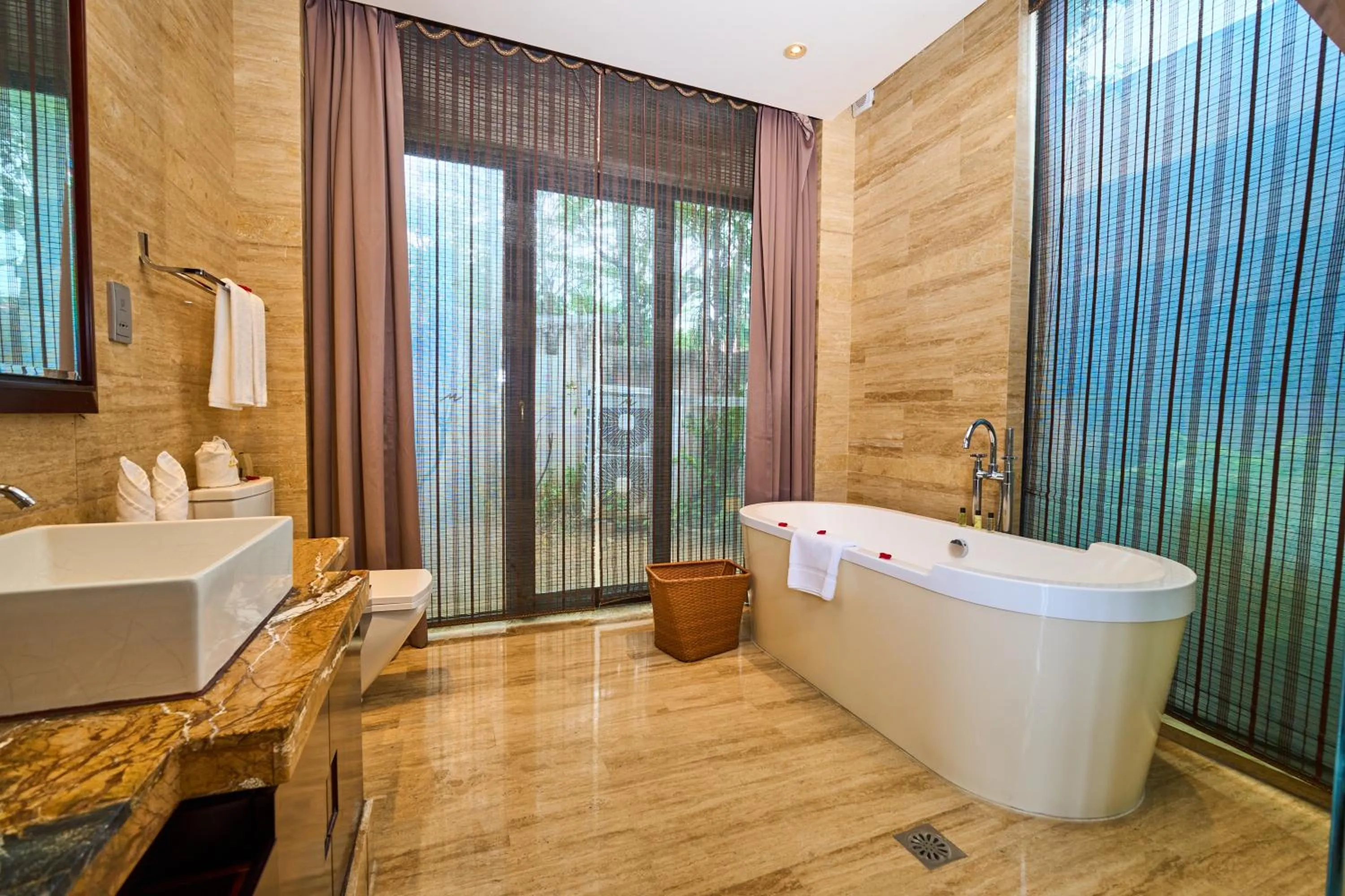 Shower in Grand Metropark Villa Resort Sanya Yalong Bay