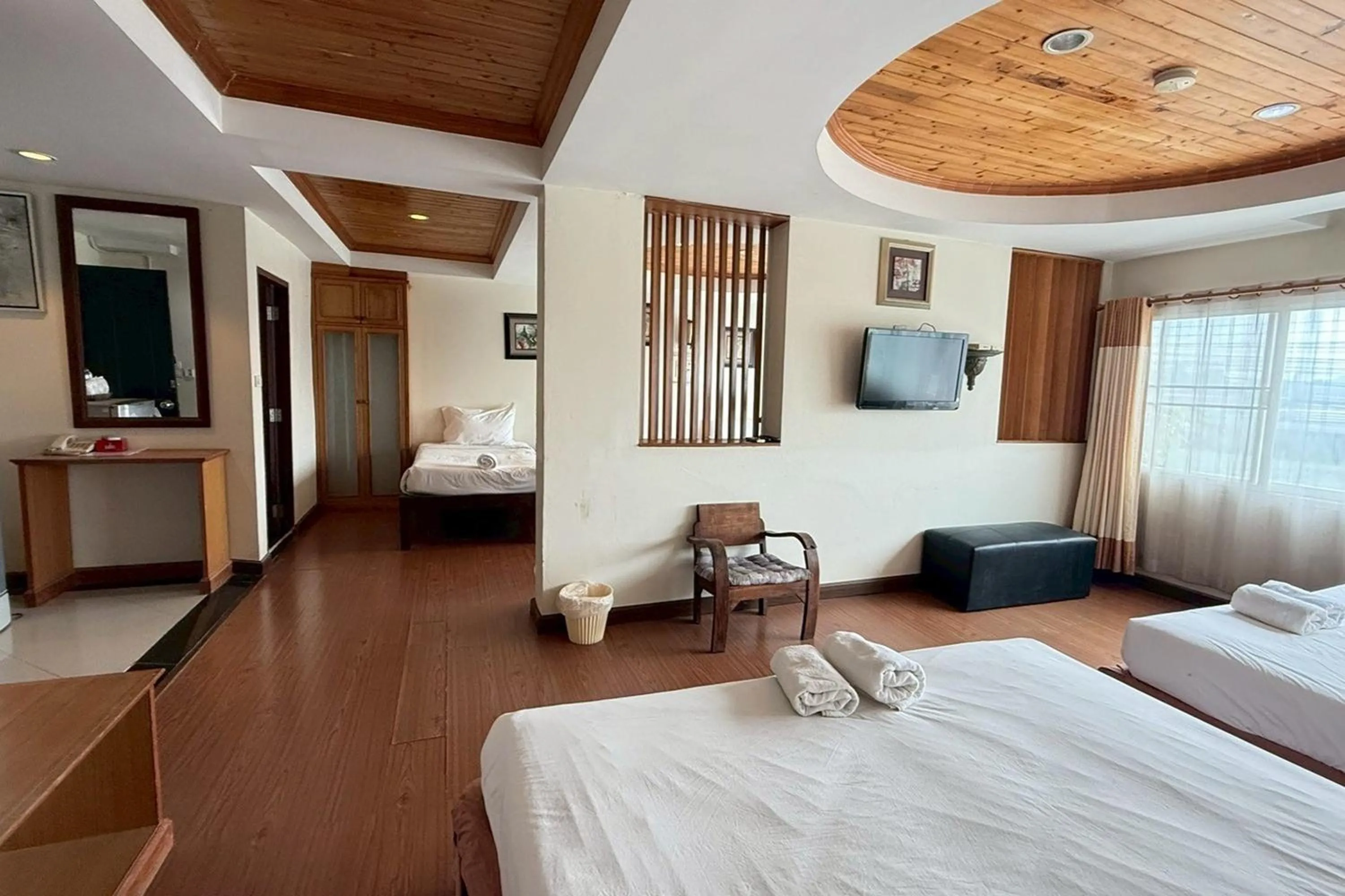 Photo of the whole room, Bed in Maekhong Delta Boutique Hotel