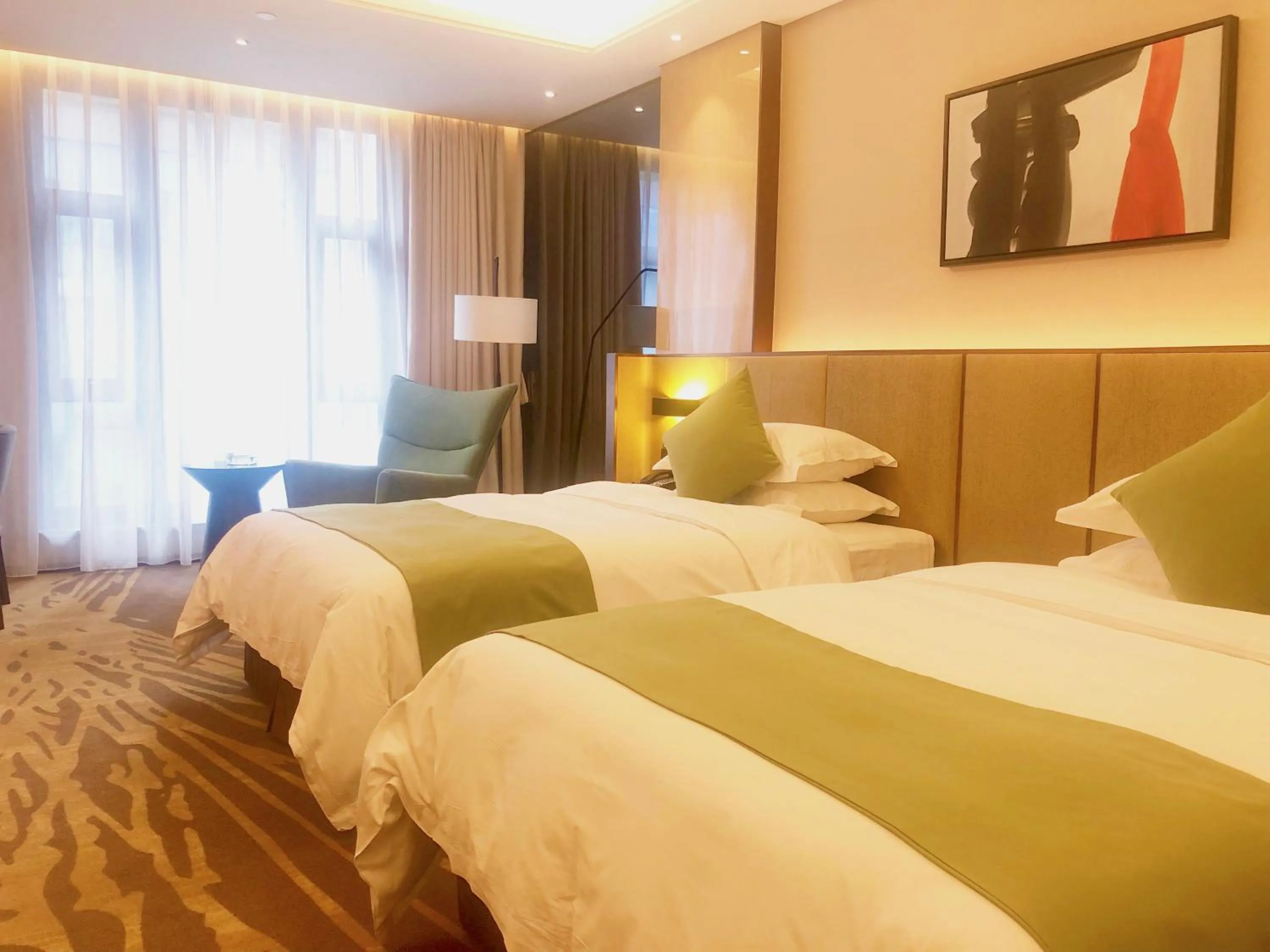 Bed in Leshan Ramada Hotel