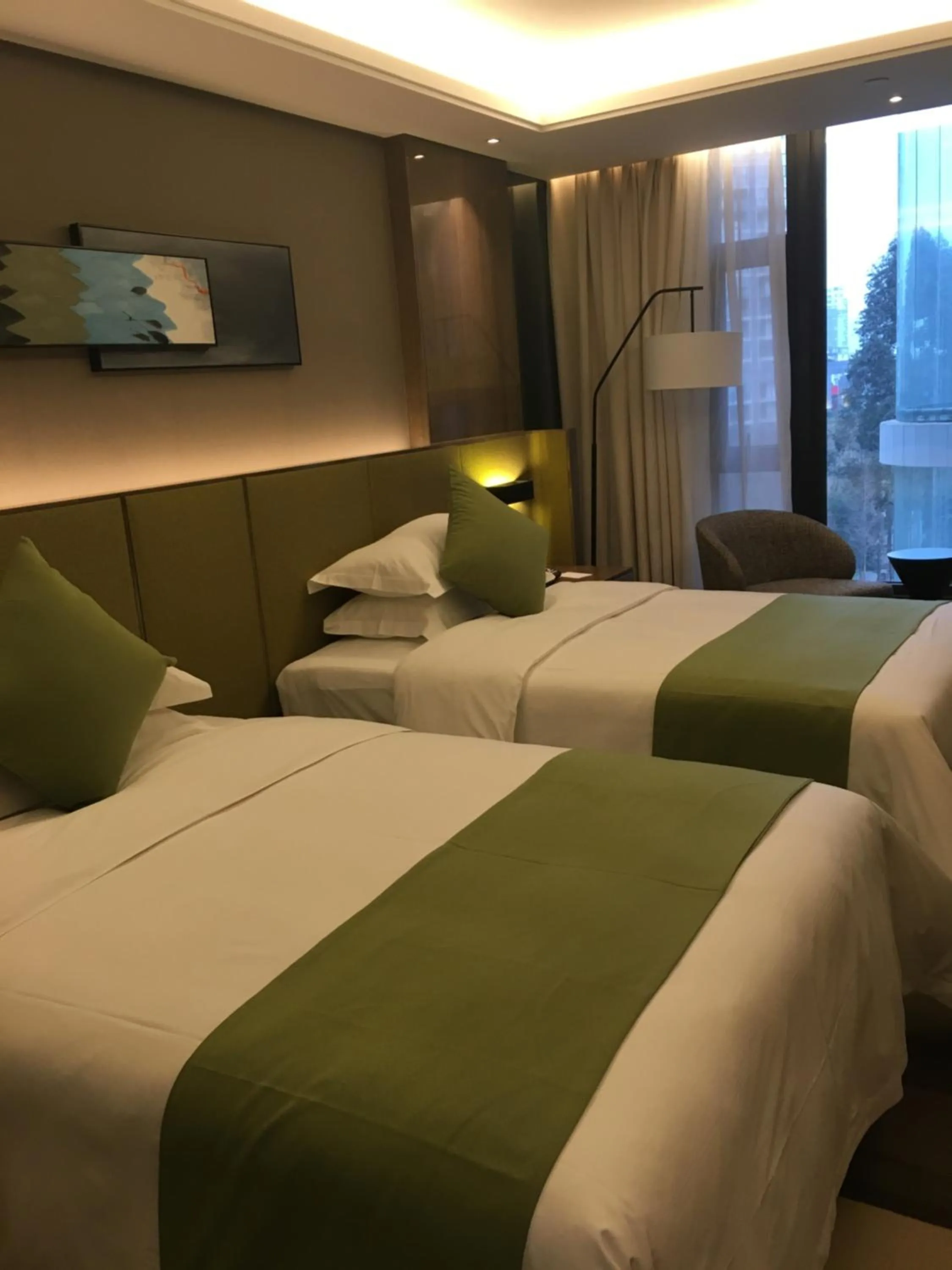 Bed in Leshan Ramada Hotel