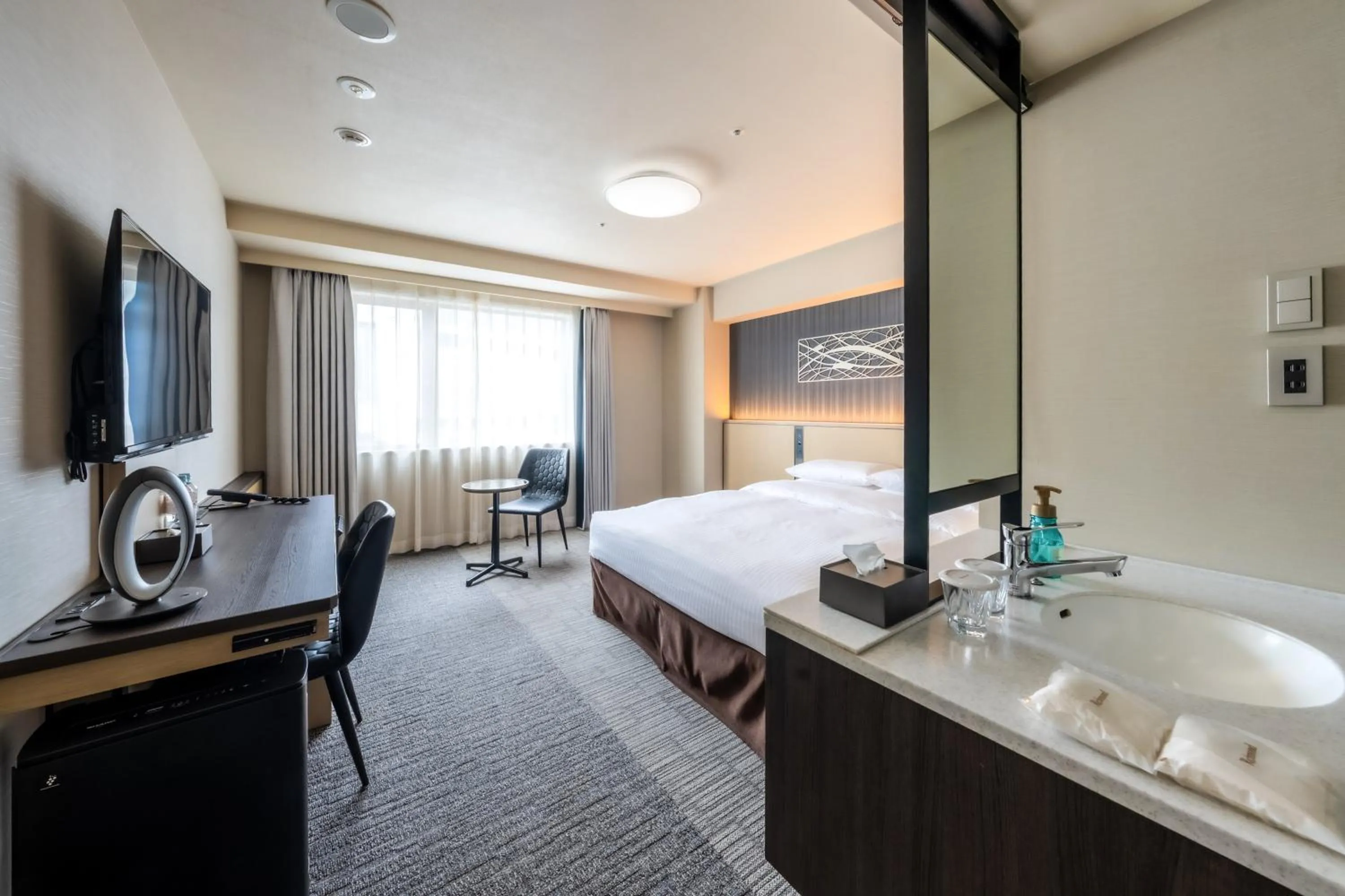 Bed in Richmond Hotel Yokohama Ekimae