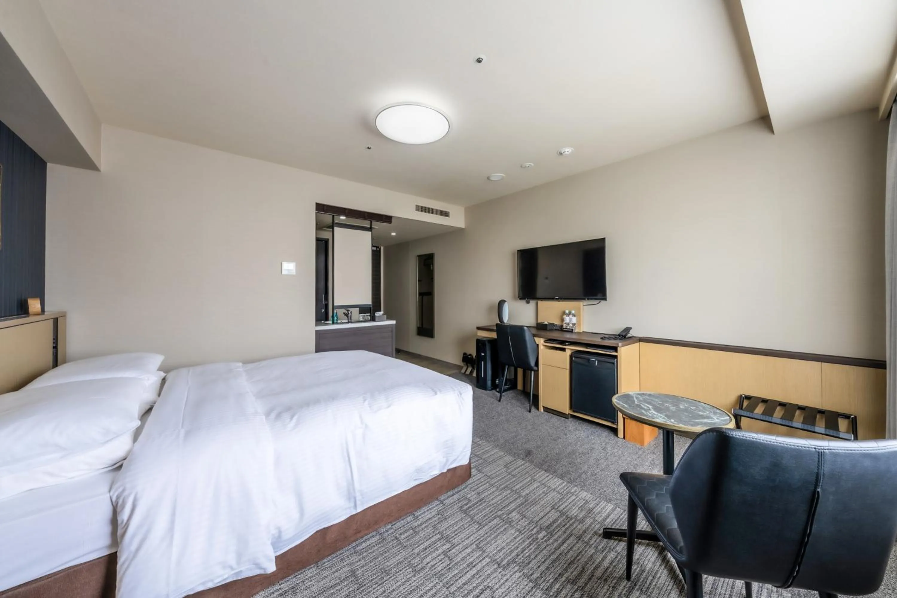 Bed in Richmond Hotel Yokohama Ekimae