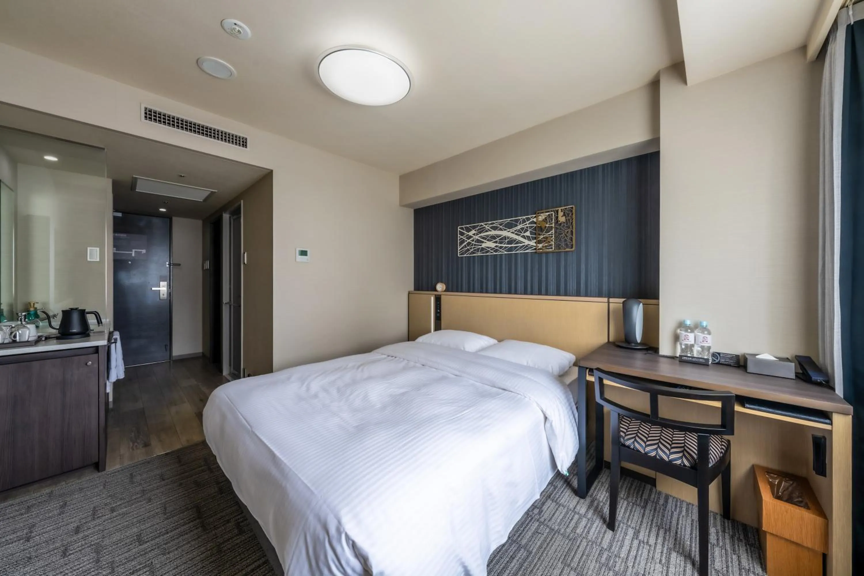 Bed in Richmond Hotel Yokohama Ekimae