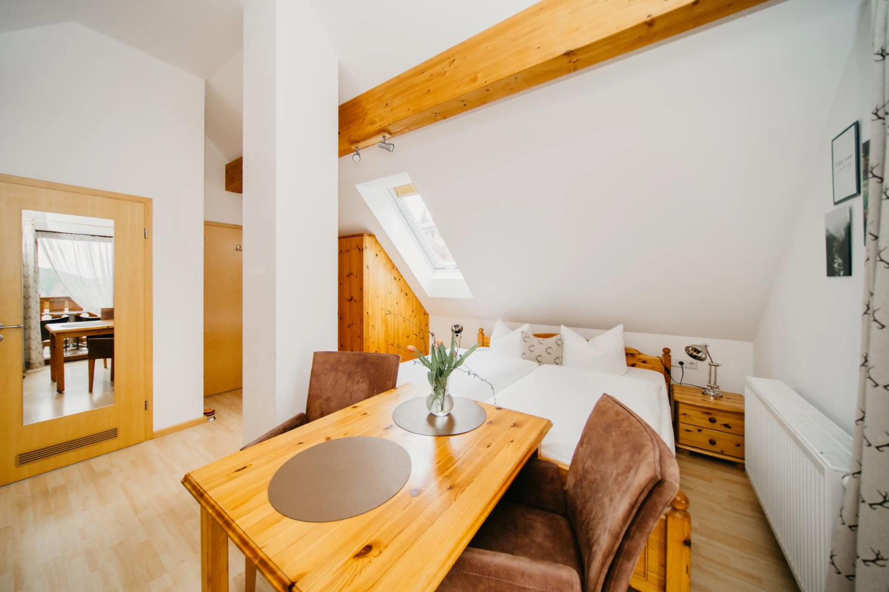 Photo of the whole room, Bed in Schwarzwald-Hotel Kraeutle