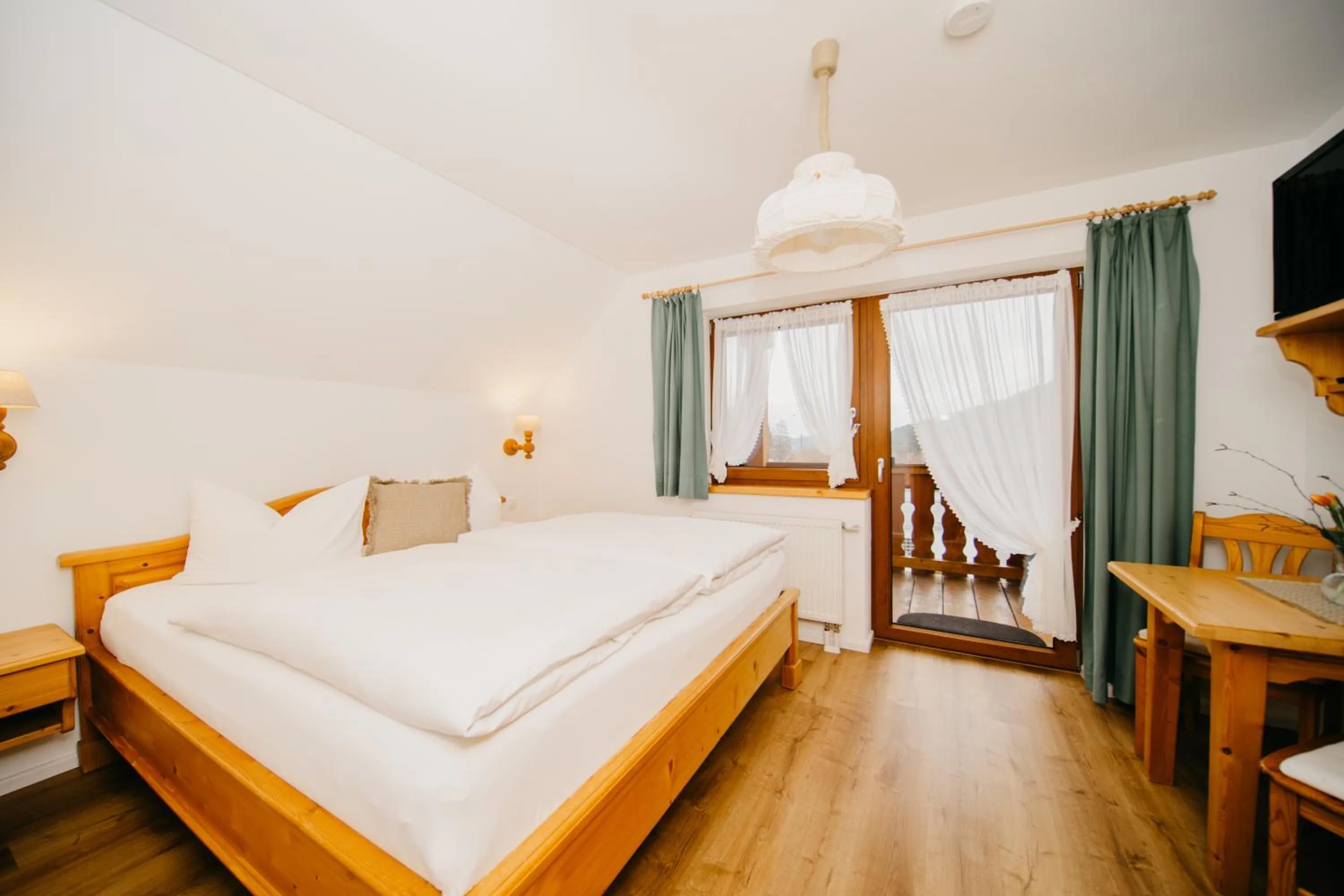 Photo of the whole room, Bed in Schwarzwald-Hotel Kraeutle