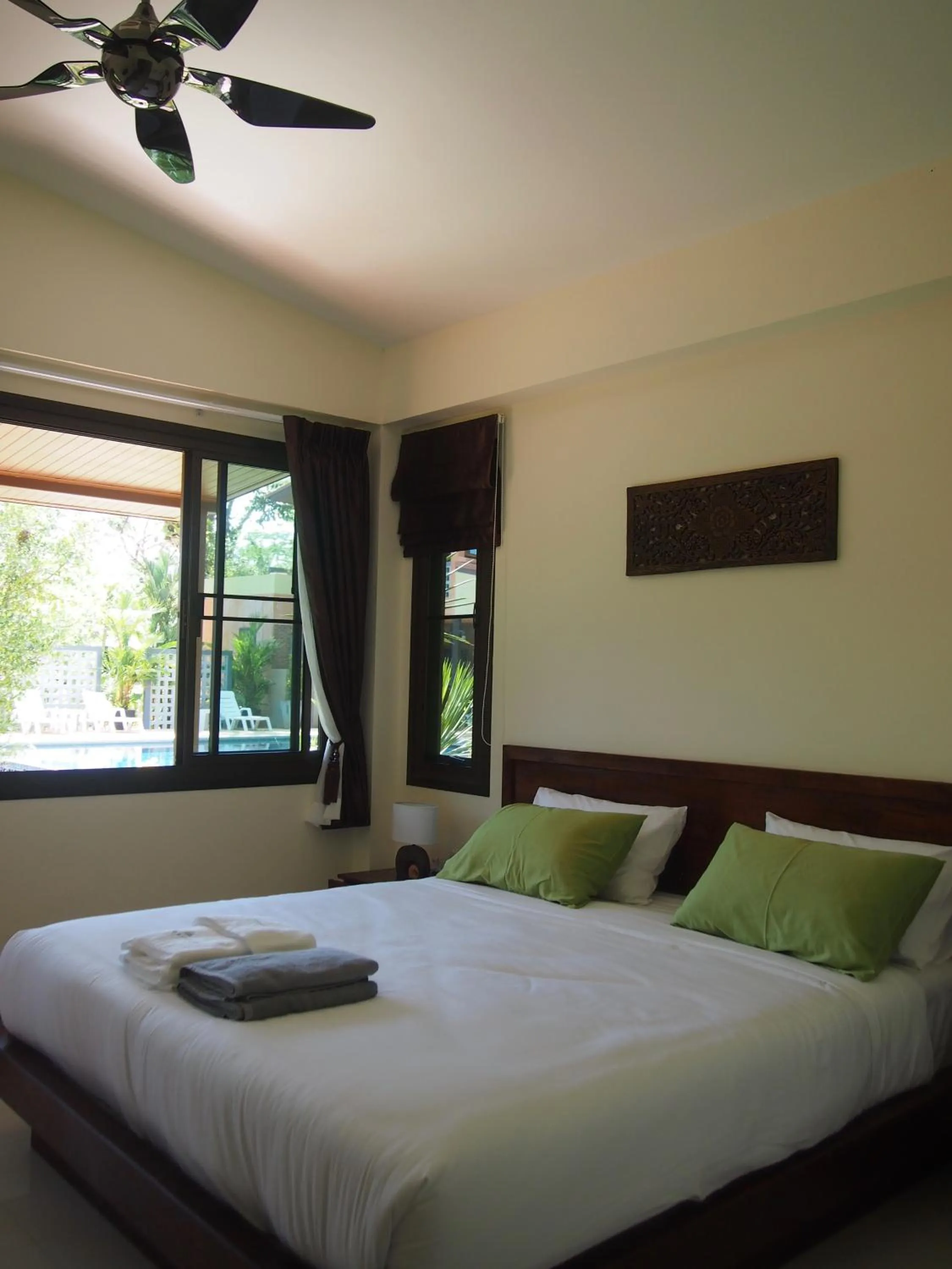 Bed in AT Bangsak Resort