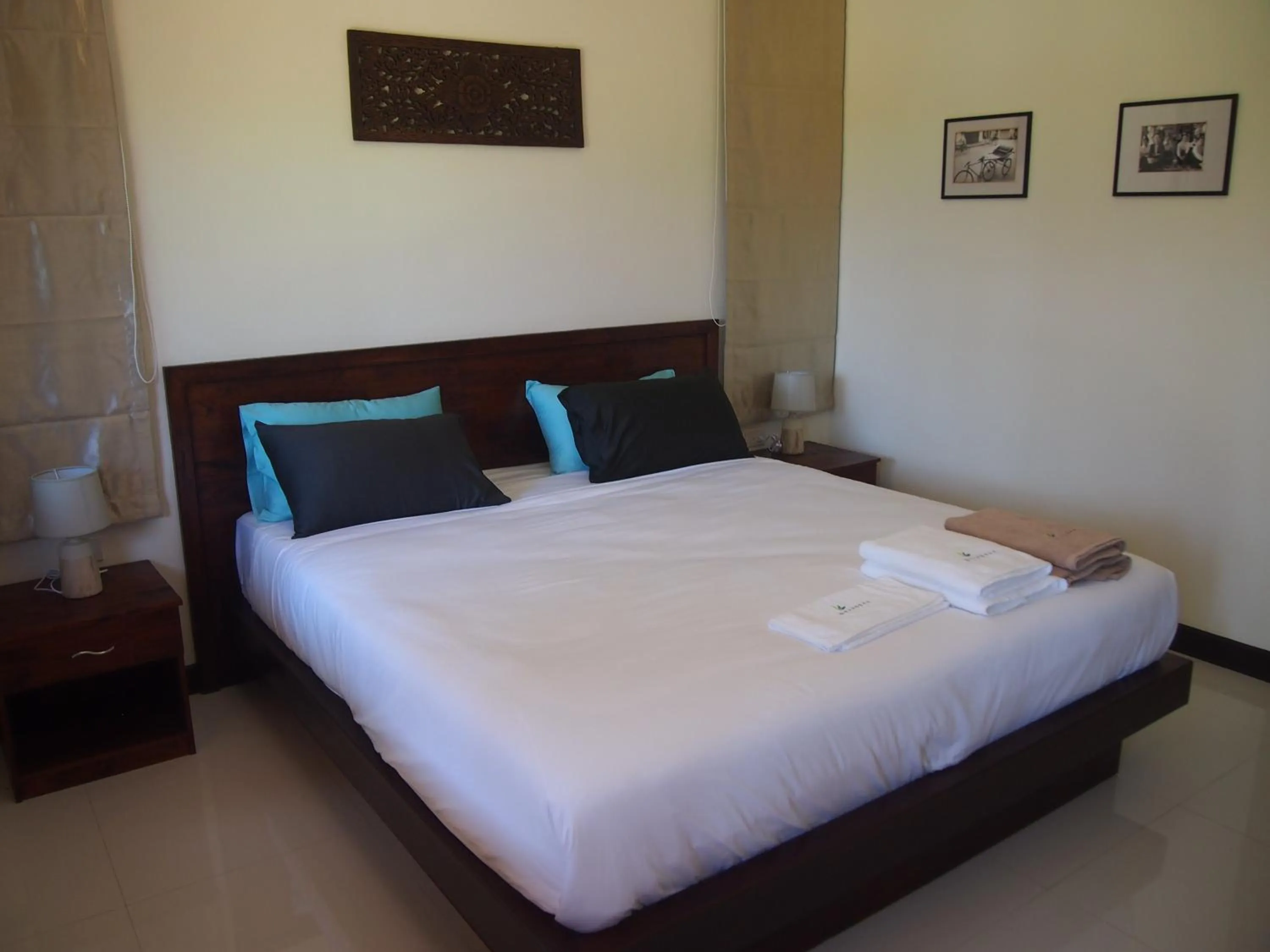 Bed in AT Bangsak Resort