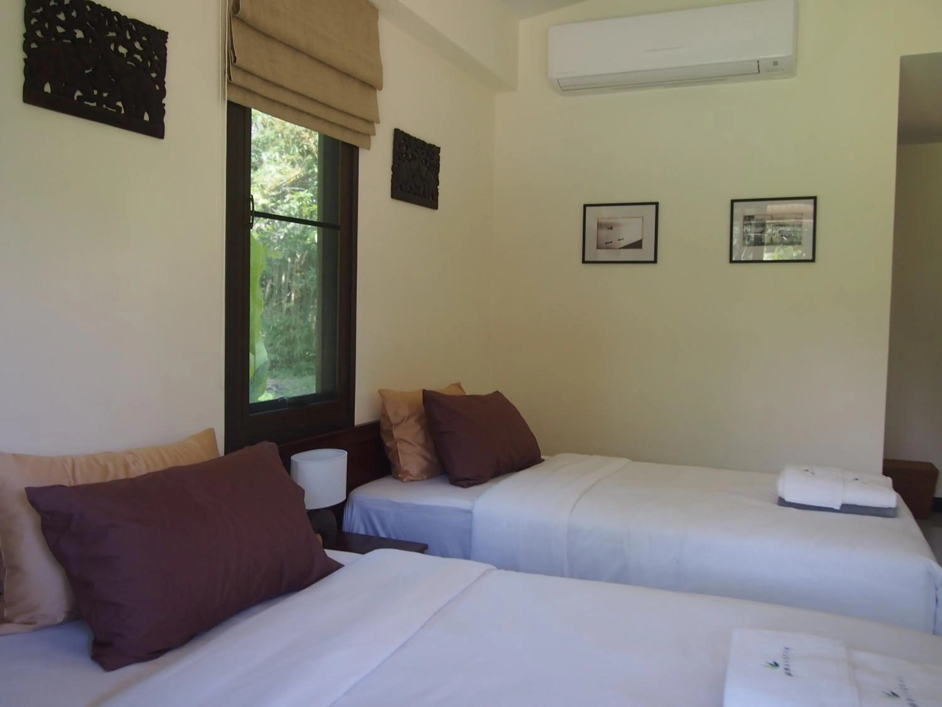 Bed in AT Bangsak Resort