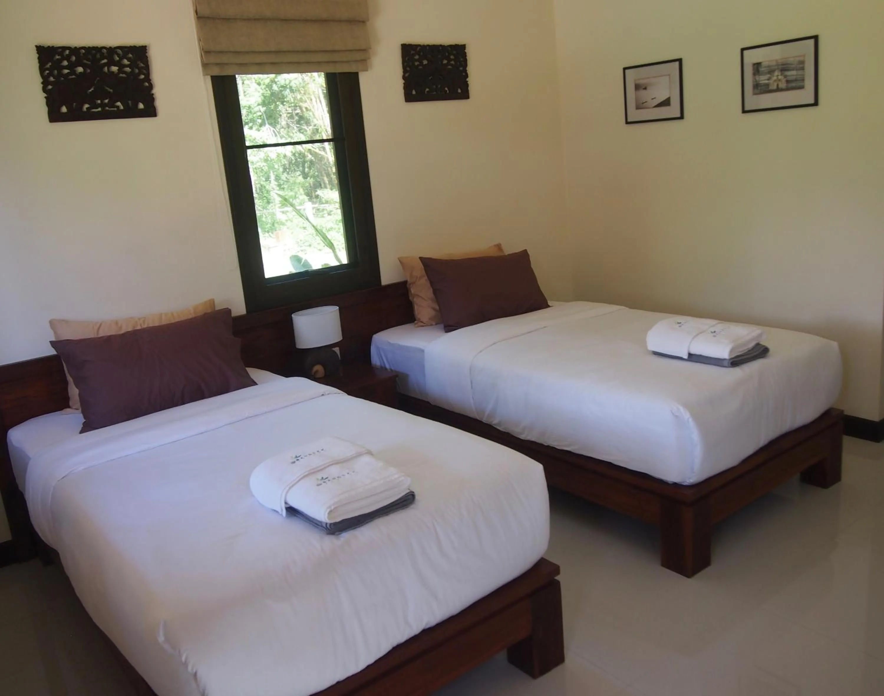 Bed in AT Bangsak Resort