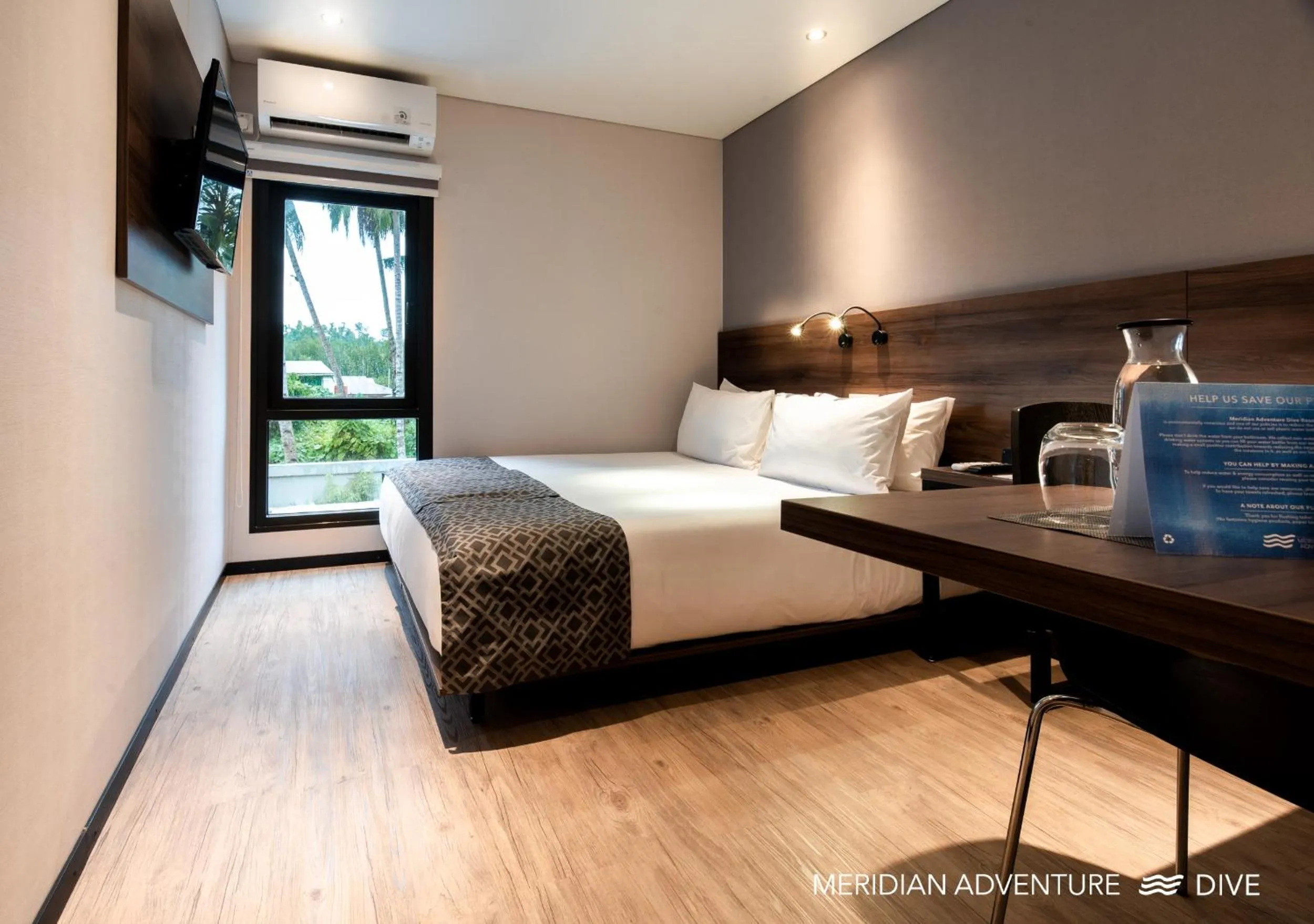 Bed in Meridian Adventure Marina Club & Resort